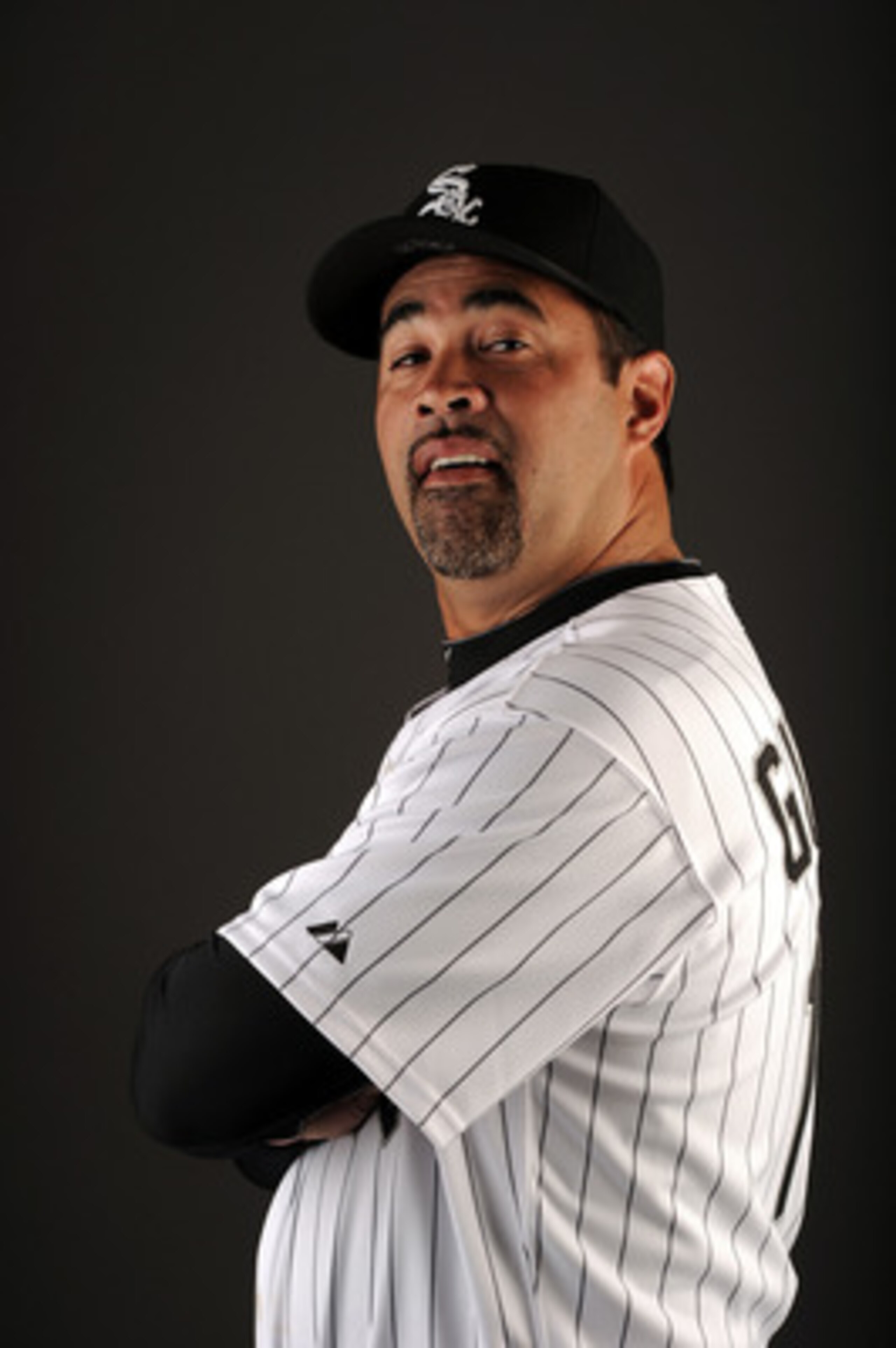 GLENDALE, AZ - FEBRUARY 26:  Manager Ozzie Guillen #13 of the Chicago White Sox poses for a photo on photo day at Camelback Ranch on February 26, 2011 in Glendale, Arizona.  (Photo by Harry How/Getty Images)