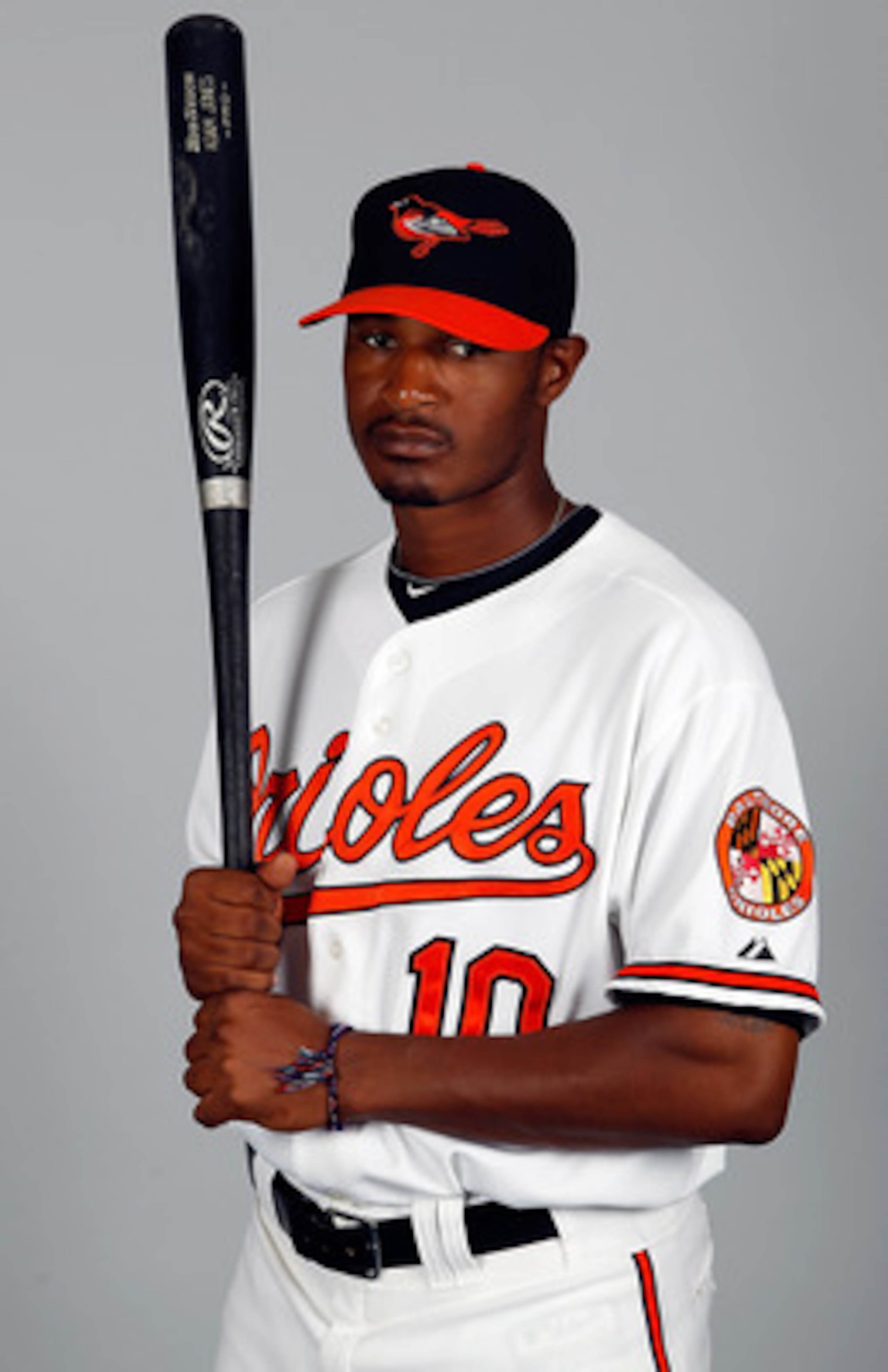 SARASOTA, FL - FEBRUARY 26:  Outfielder Adam Jones #10 of the Baltimore Orioles poses for a photo during photo day at Ed Smith Stadium on February 26, 2011 in Sarasota, Florida.  (Photo by J. Meric/Getty Images)