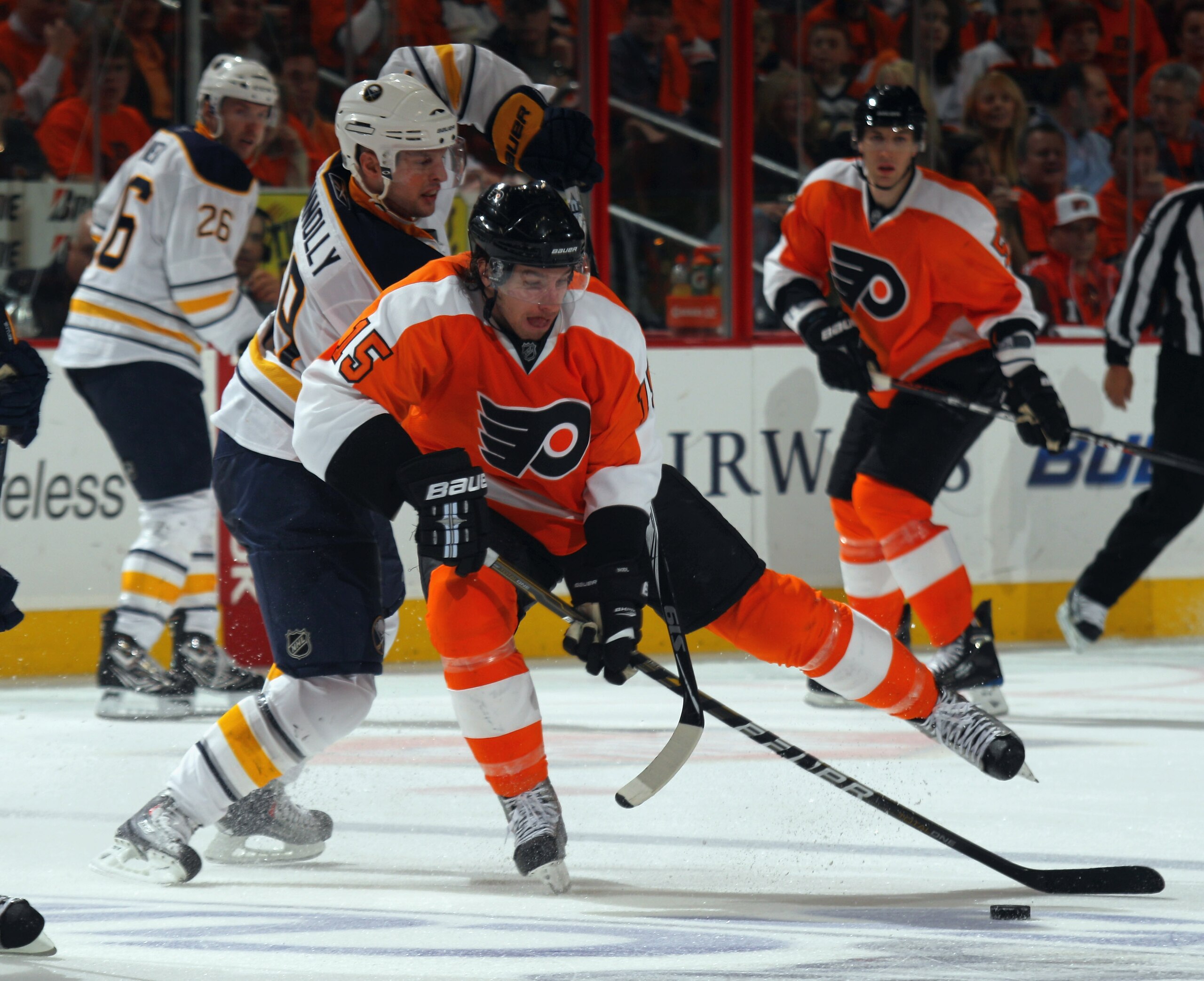 PHILADELPHIA, PA - APRIL 14: Tim Connolly #19 of the Buffalo Sabres checks Andreas Nodl #15 of the Philadelphia Flyers in Game One of the Eastern Conference Quarterfinals during the 2011 NHL Stanley Cup Playoffs at Wells Fargo Center on April 14, 2011 in