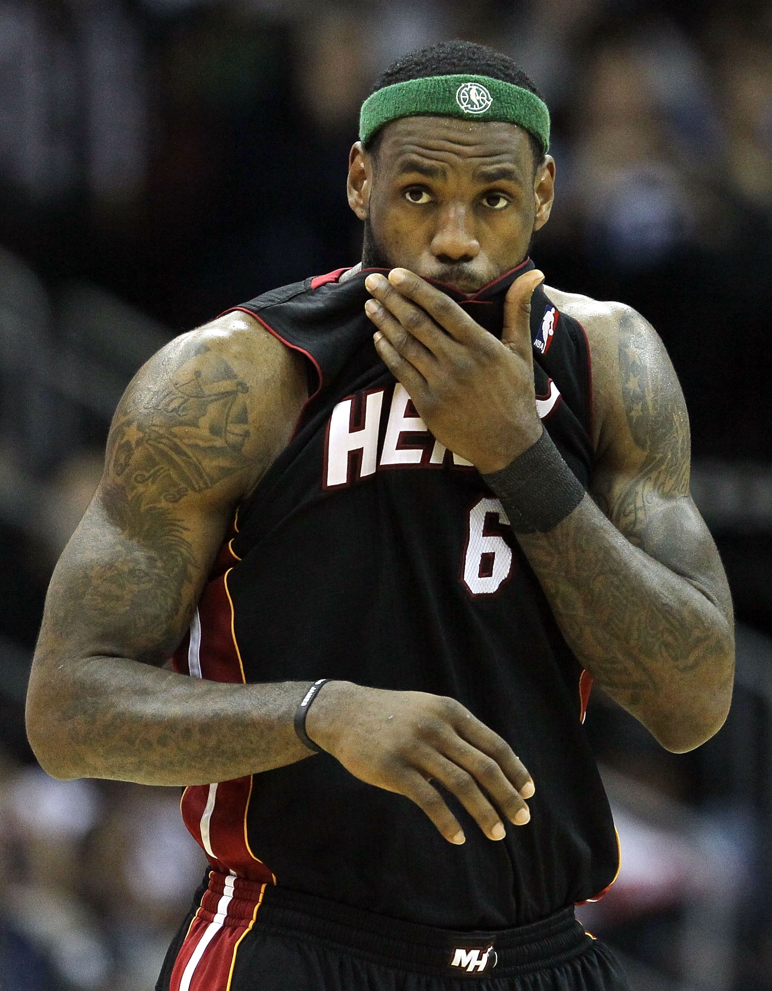 NEWARK, NJ - APRIL 03:  LeBron James #6 of the Miami Heat looks on against the New Jersey Nets at the Prudential Center on April 3, 2011 in Newark, New Jersey.NOTE TO USER: User expressly acknowledges and agrees that, by downloading and/or using this Phot