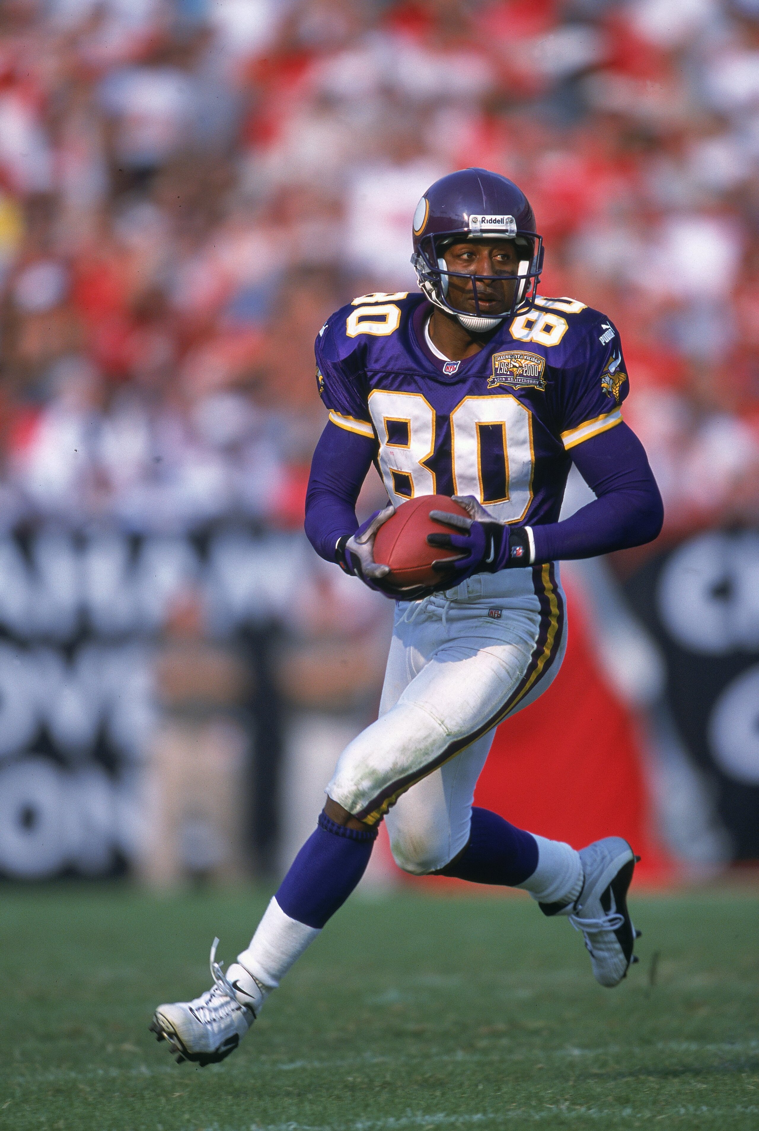 29 Oct 2000:  Cris Carter #80 of the Minnesota Vikings runs with the ball during the game against the Tampa Bay Buccaneers at the Raymond James Stadium in Tampa. The Buccaneers defeated the Vikings 41-13.Mandatory Credit: Andy Lyons  /Allsport