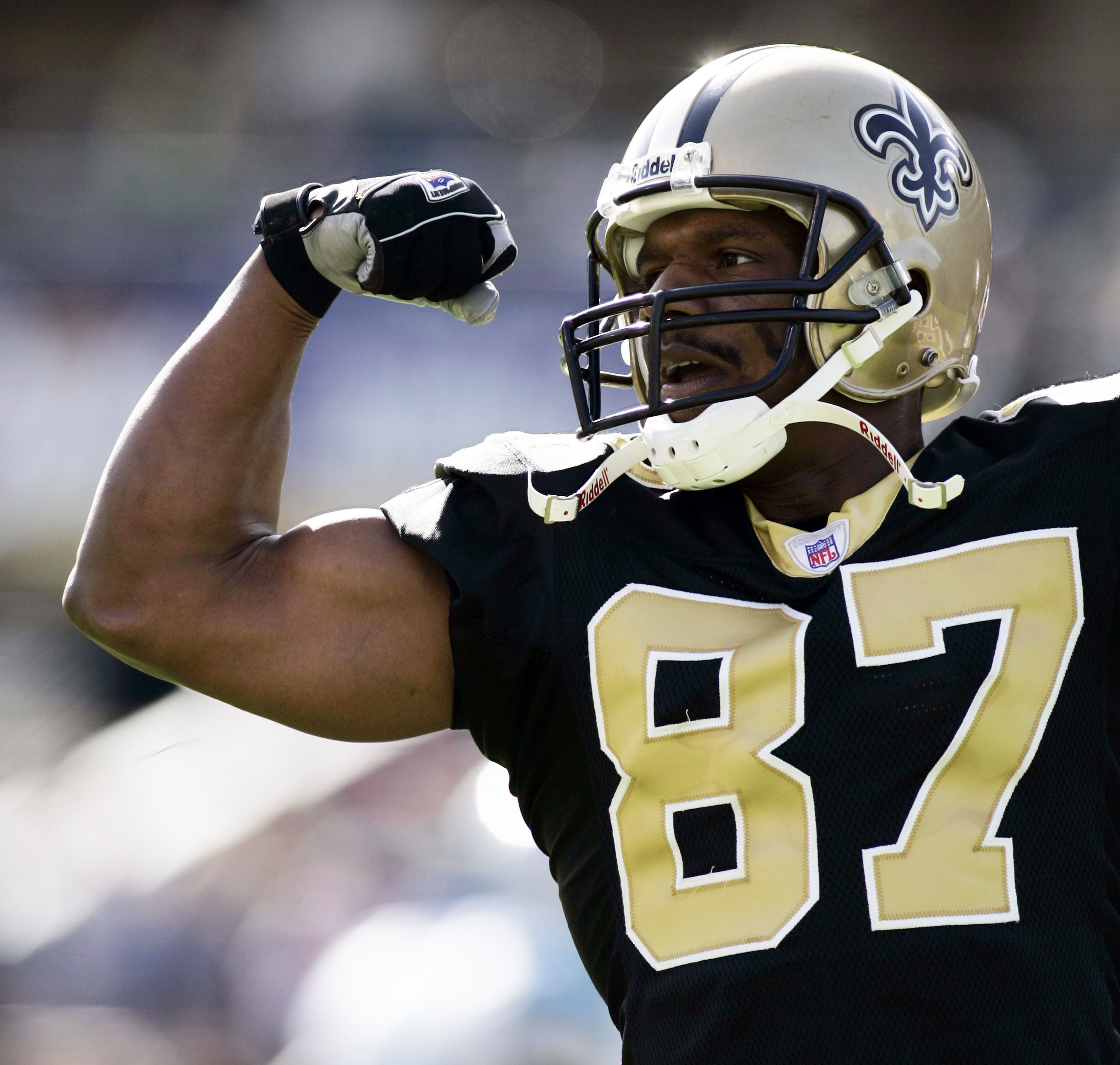 BATON ROUGE, LA - DECEMBER 18:  Joe Horn #87 of the New Orleans Saints celebrates after Marlon McCree #27 of the Carolina Panthers  was called for helmet to helmet contact on December 18, 2005 at Tiger Stadium in Baton Rouge, Louisiana.  The Panthers defe