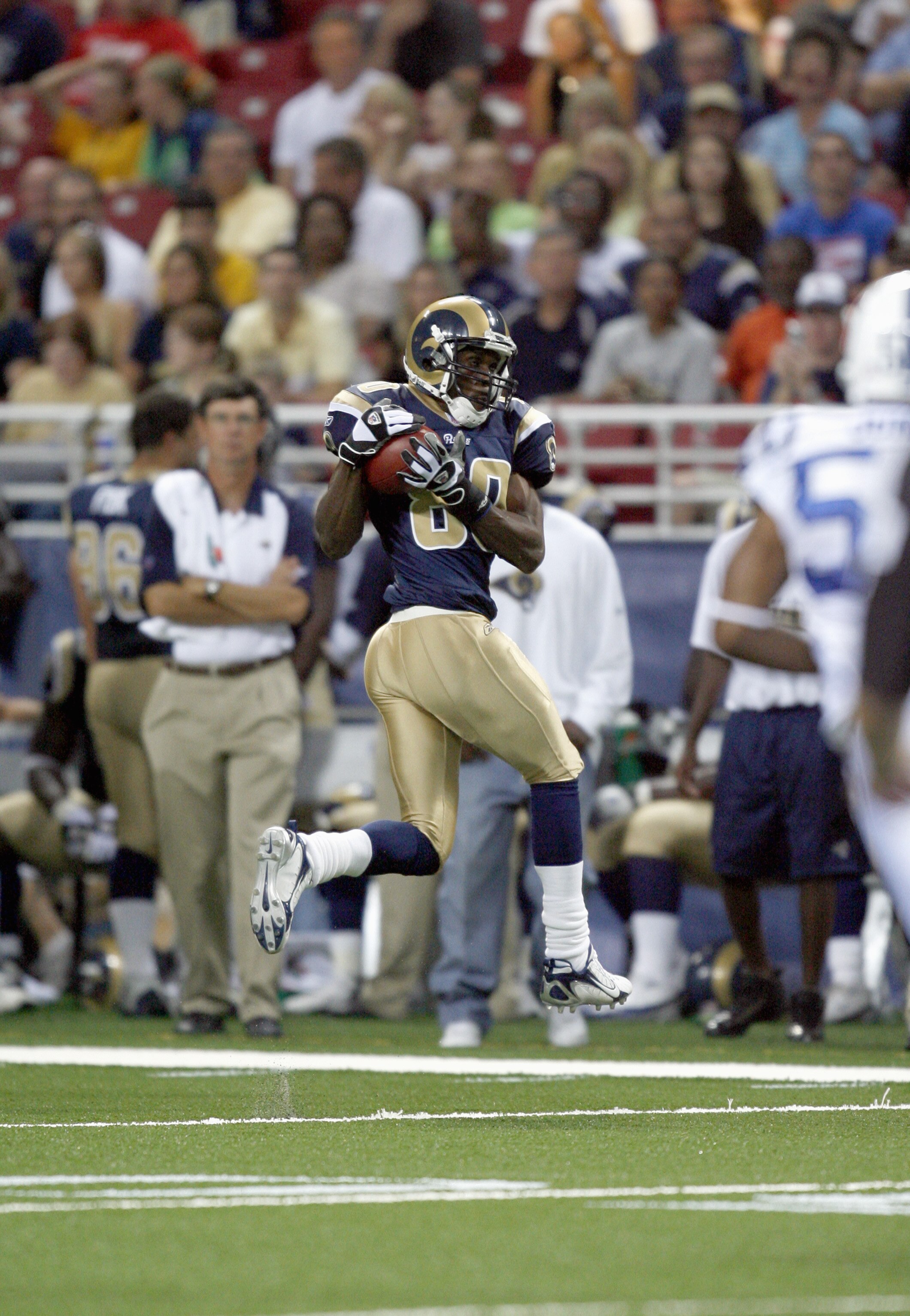 ST. LOUIS - AUGUST 10: Isaac Bruce #80 of the St. Louis Rams makes a catch during the preseason game against the Indianapolis Colts at the Edward Jones Dome on August 10, 2006 in St. Louis, Missouri. (Photo by: Dilip Vishwanat/Getty Images)