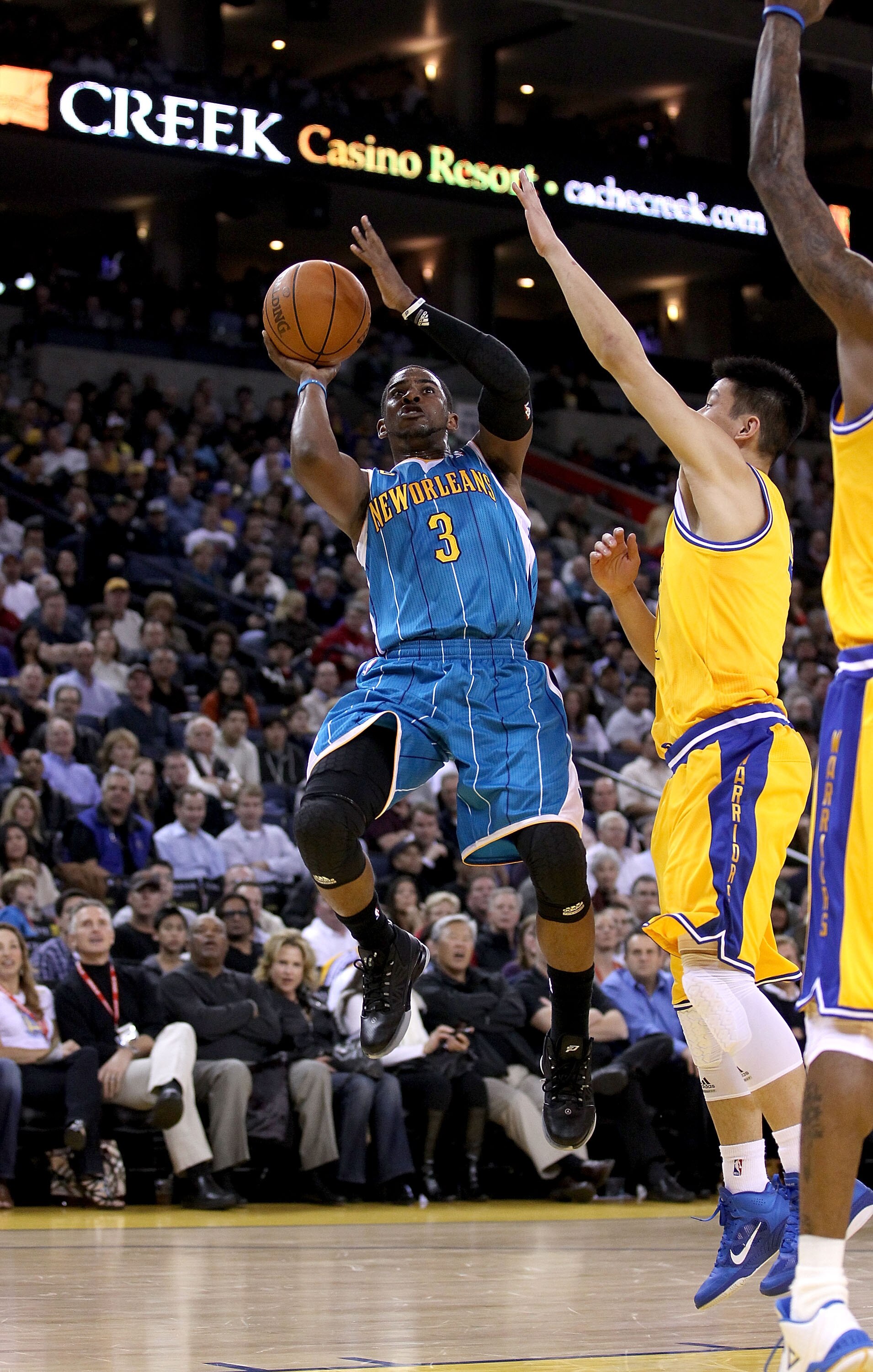 OAKLAND, CA - FEBRUARY 15:  Chris Paul #3 of the New Orleans Hornets in action against the Golden State Warriors at Oracle Arena on February 15, 2011 in Oakland, California. NOTE TO USER: User expressly acknowledges and agrees that, by downloading and or