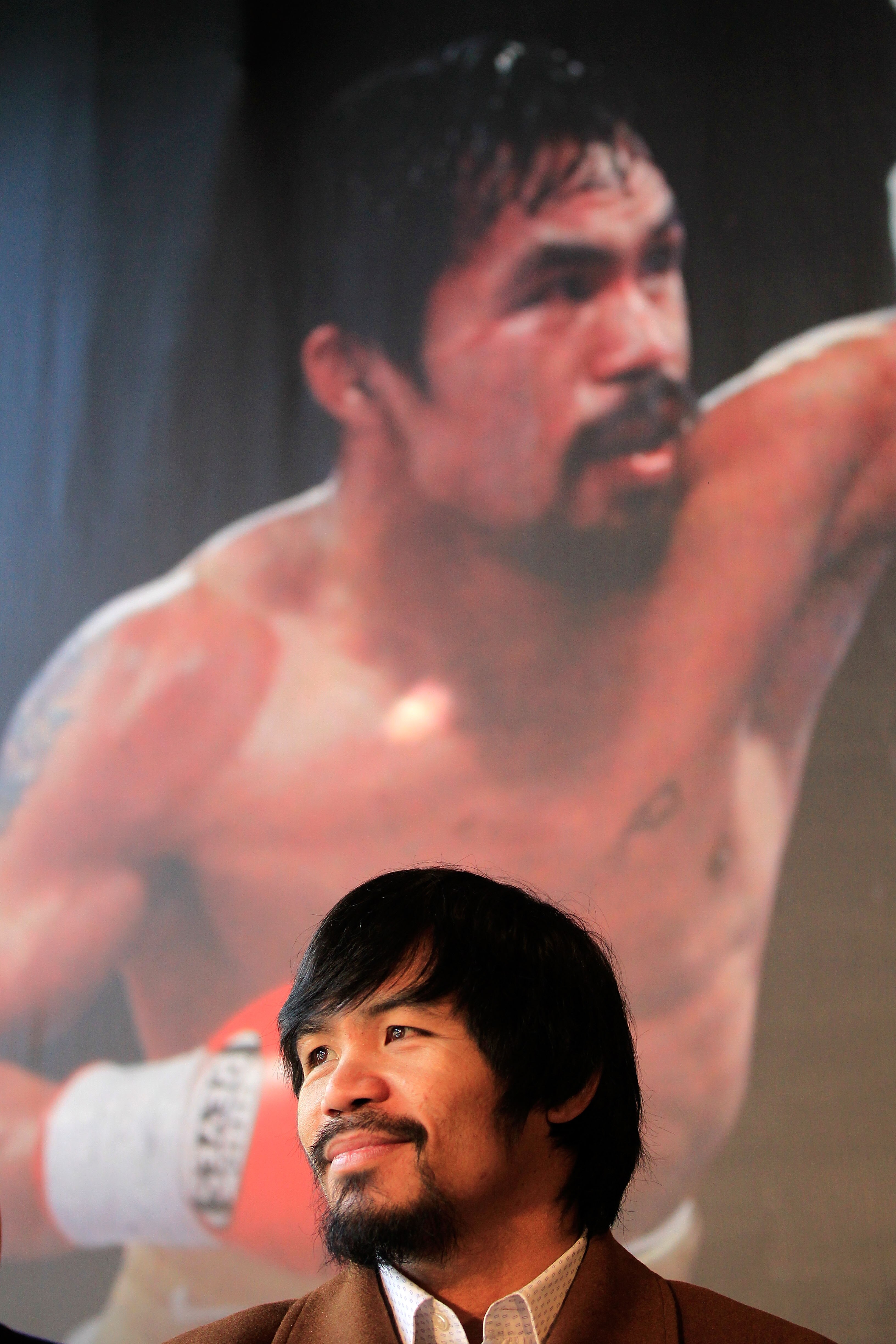 NEW YORK, NY - FEBRUARY 14:  Manny Pacquiao looks on at a press conference to promote his upcoming fight with Shane Mosley at The Lighthouse at Chelsea Piers on February 14, 2011 in New York City.  (Photo by Chris Trotman/Getty Images)