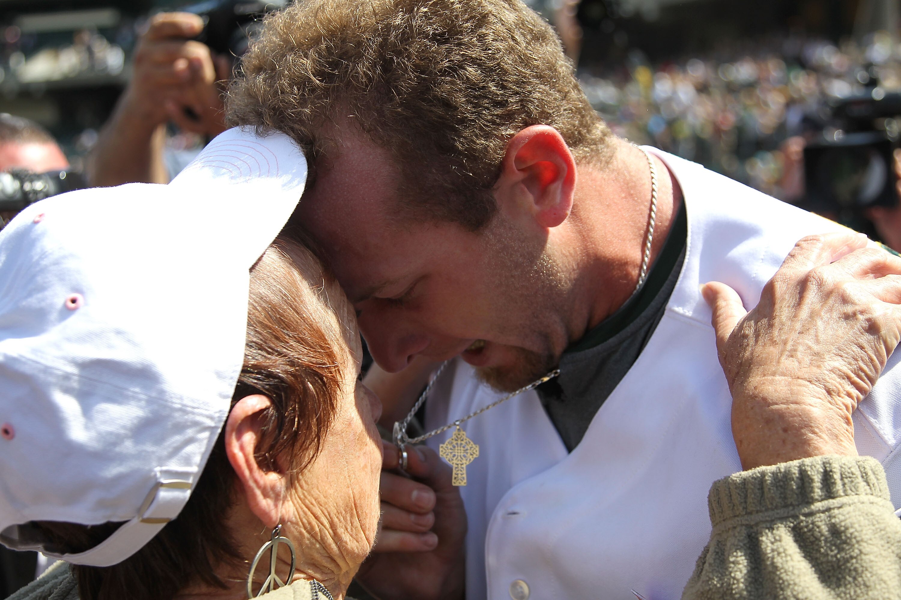 OAKLAND, CA - MAY 09:  Dallas Braden #51 of the Oakland Athletics celebrates after pitching a perfect game against the Tampa Bay Rays with his grandmother Peggy Lindsey during an MLB game at the Oakland-Alameda County Coliseum on May 9, 2010 in Oakland, C