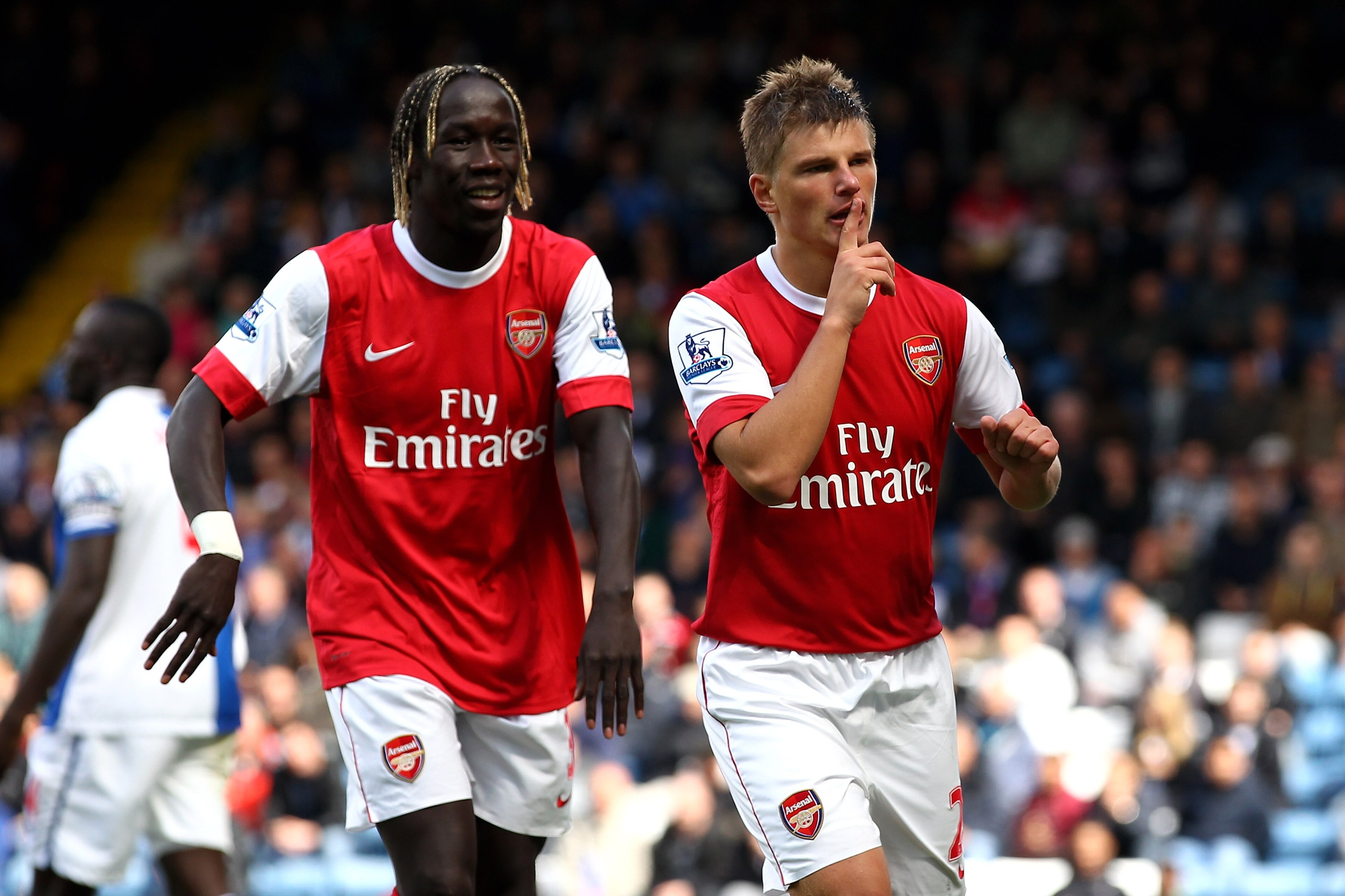 BLACKBURN, ENGLAND - AUGUST 28: Andrey Arshavin of Arsenal celebrates scoring his team's second goal with team mate Bacary Sagna (L) during the Barclays Premier League match between Blackburn Rovers and Arsenal at Ewood Park on August 28, 2010 in Blackbu BLACKBURN, ENGLAND - AUGUST 28: Andrey Arshavin of Arsenal celebrates scoring his team's second goal with team mate Bacary Sagna (L) during the Barclays Premier League match between Blackburn Rovers and Arsenal at Ewood Park on August 28, 2010 in Blackbu