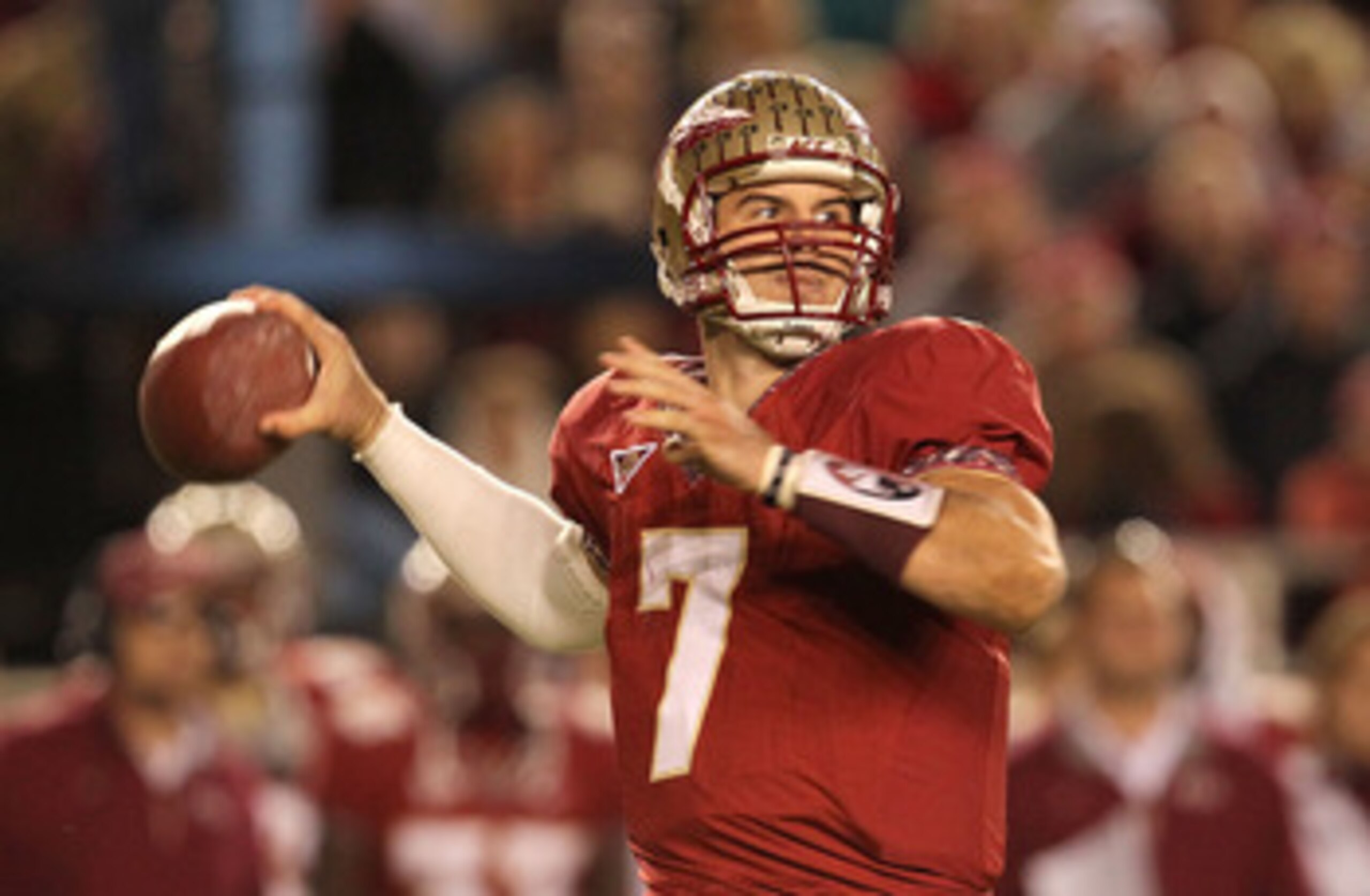 TALLAHASSEE, FL - NOVEMBER 27:  Christian Ponder #7 of the Florida State Seminoles throws for a first down during a game against the Florida Gators at Doak Campbell Stadium on November 27, 2010 in Tallahassee, Florida.  (Photo by Mike Ehrmann/Getty Images