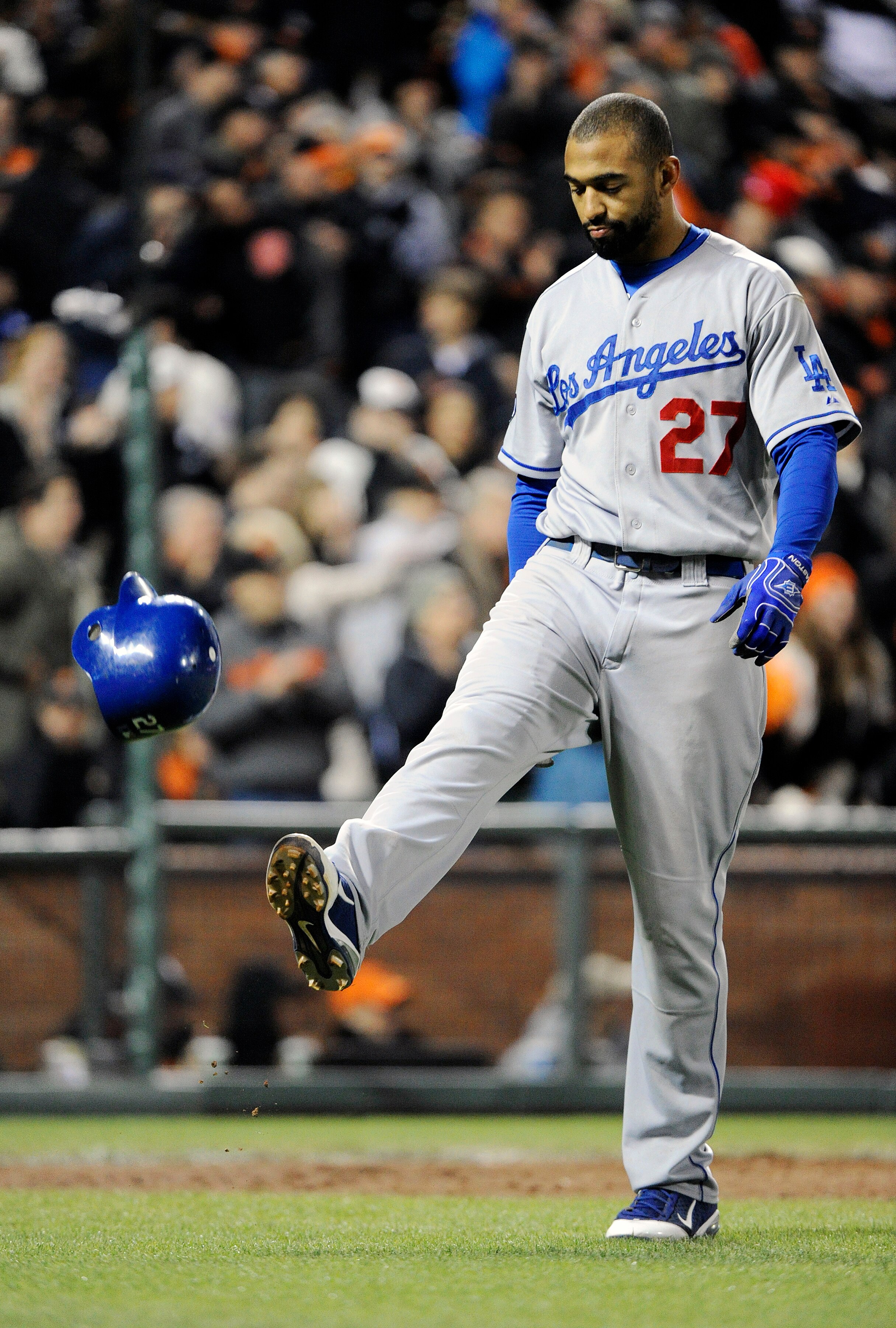 SAN FRANCISCO, CA - APRIL 13:  Matt Kemp #27 of the Los Angeles Dodgers kicks his helmet after striking out for the third out in the top of the 7th inning against the San Francisco Giants during a MLB baseball game at AT&T Park April 13, 2011 in San Franc