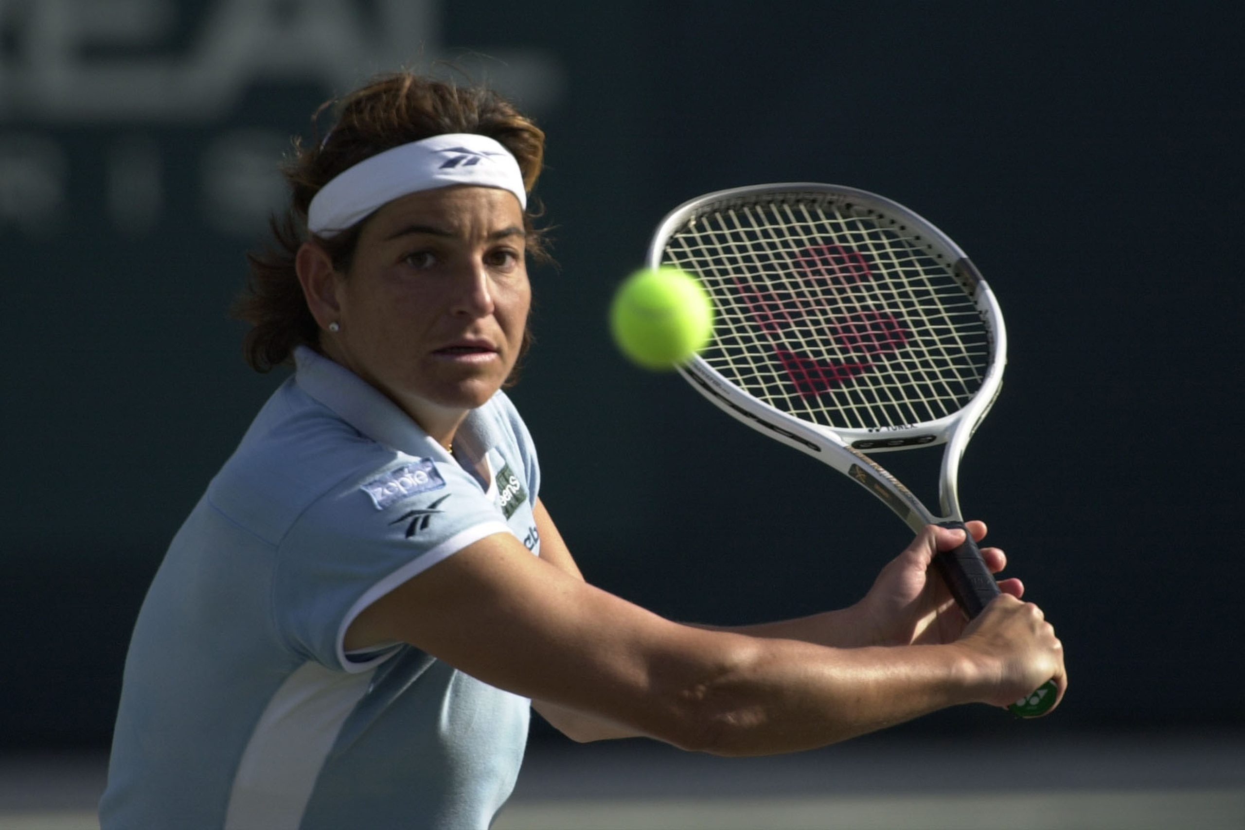 17  Apr 2001:  Aranxta Sanchez Vicario of Spain returns a shot to Andrea Glass of Germany and Iva Majoli of Croatia while playing doubles with Jennifer Capriati during the first round of the Family Circle Cup at the Tennis Center at Daniel Island in Charl