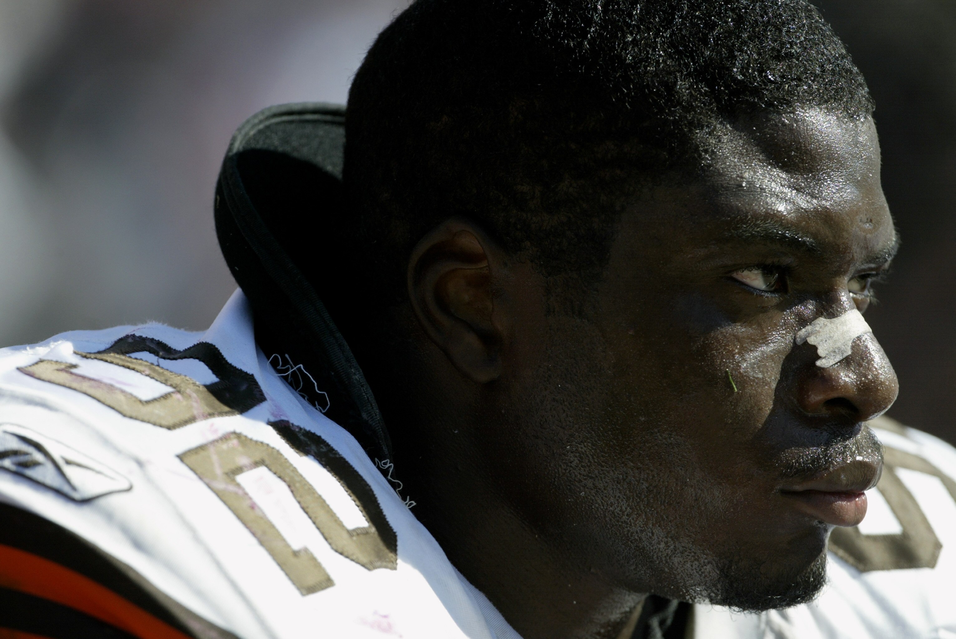 SAN FRANCISCO - SEPTEMBER 21: Defensive lineman Courtney Brown #92 of the Cleveland Browns watches the game against the San Francisco 49ers at Candlestick Park on September 21, 2003 in San Francisco, California. The Browns defeated the 49ers 13-12. (Phot SAN FRANCISCO - SEPTEMBER 21: Defensive lineman Courtney Brown #92 of the Cleveland Browns watches the game against the San Francisco 49ers at Candlestick Park on September 21, 2003 in San Francisco, California. The Browns defeated the 49ers 13-12. (Phot
