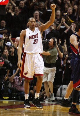 MIAMI - APRIL 25:  Jamaal Magloire #21 of the Miami Heat celebrates after the Heat take a 21 point lead at half-time against the Atlanta Hawks during Game Three of the Eastern Conference Quarterfinals at American Airlines Arena on April 25, 2009 in Miami,