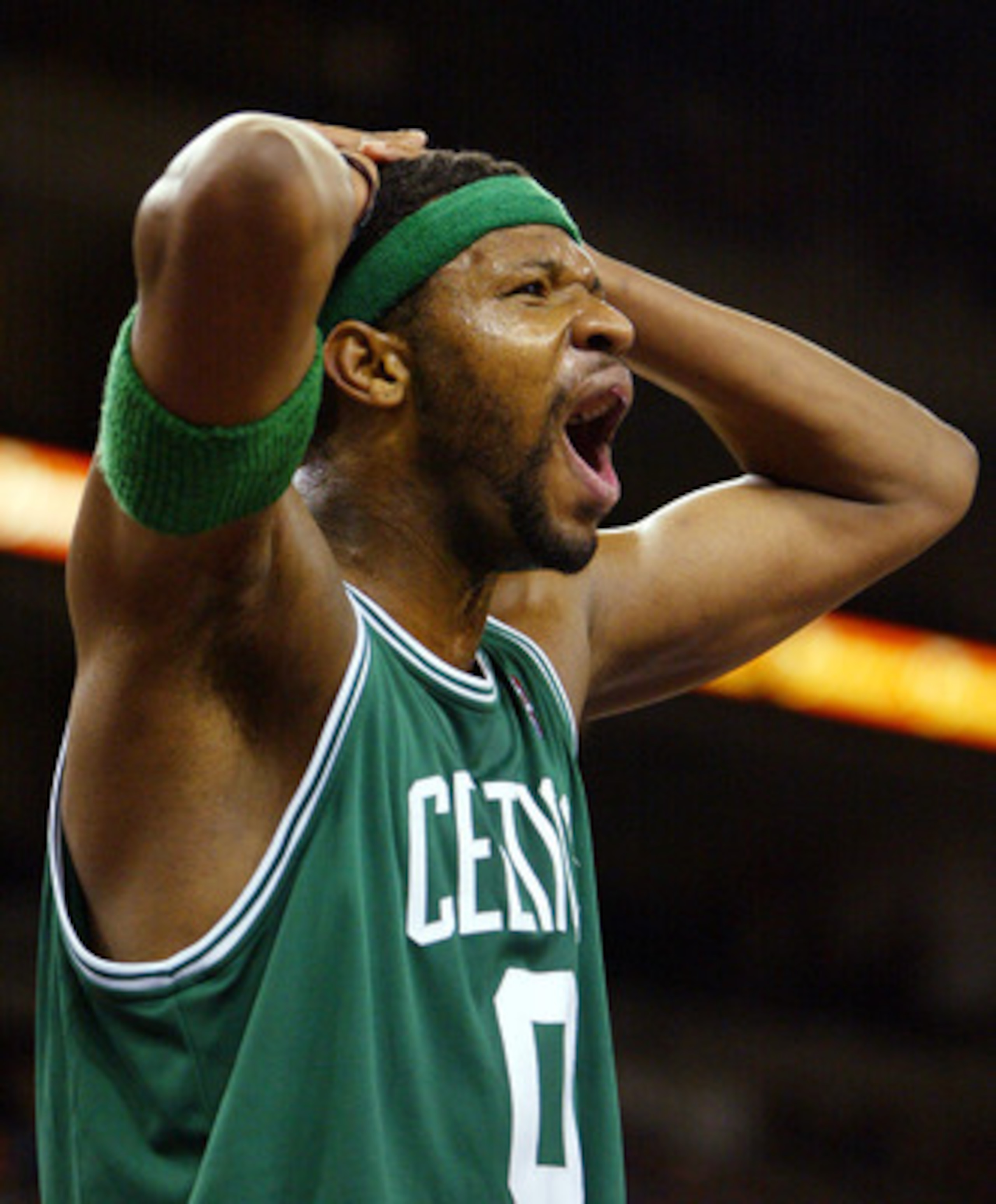 OAKLAND, CA -  DECEMBER 29:  Walter McCarty #0 of the Boston Celtics reacts to a call against  the Golden State Warriors during an NBA game at the Arena in Oakalnd on December 29, 2003 in Oakland, California.  NOTE TO USER: User expressly acknowledges and