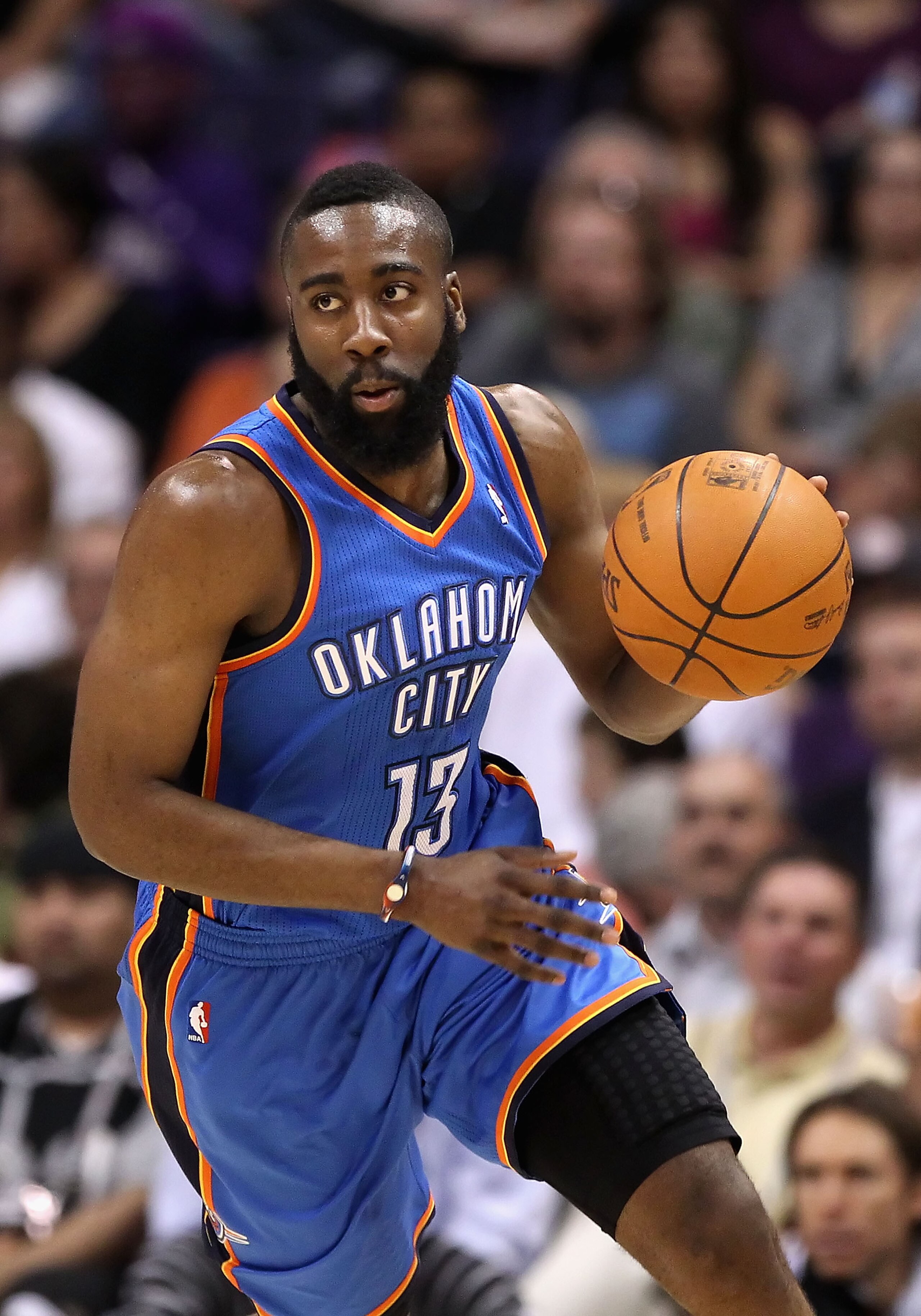 PHOENIX, AZ - MARCH 30: James Harden #13 of the Oklahoma City Thunder handles the ball during the NBA game against the Phoenix Suns at US Airways Center on March 30, 2011 in Phoenix, Arizona. The Thunder defeated the Suns 116-98. NOTE TO USER: User exp PHOENIX, AZ - MARCH 30: James Harden #13 of the Oklahoma City Thunder handles the ball during the NBA game against the Phoenix Suns at US Airways Center on March 30, 2011 in Phoenix, Arizona. The Thunder defeated the Suns 116-98. NOTE TO USER: User exp