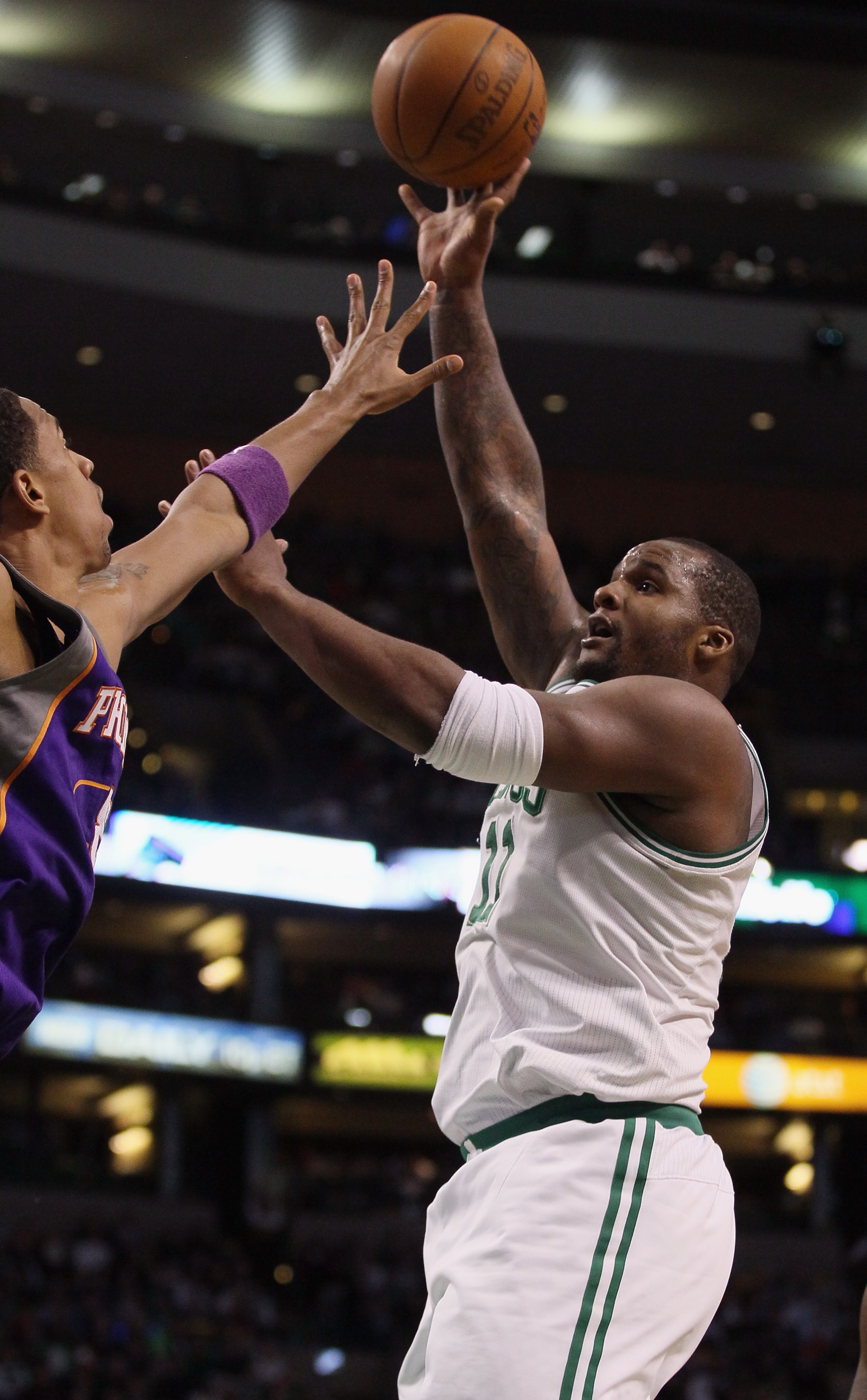 BOSTON, MA - MARCH 02: Glen Davis #11 of the Boston Celtics takes a shot in the first half against the Phoenix Suns on March 2, 2011 at the TD Garden in Boston, Massachusetts. NOTE TO USER: User expressly acknowledges and agrees that, by downloading and/ BOSTON, MA - MARCH 02: Glen Davis #11 of the Boston Celtics takes a shot in the first half against the Phoenix Suns on March 2, 2011 at the TD Garden in Boston, Massachusetts. NOTE TO USER: User expressly acknowledges and agrees that, by downloading and/