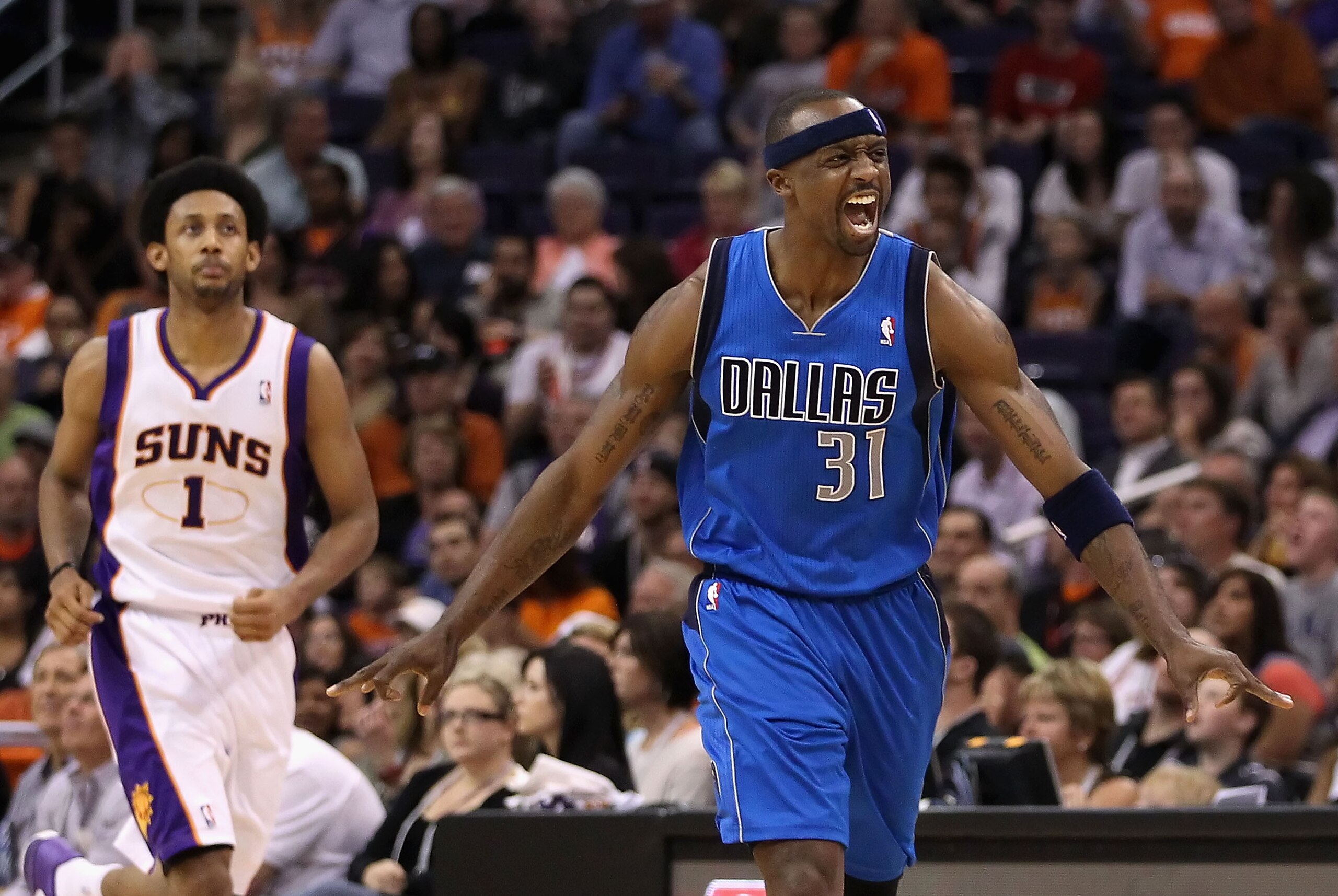 PHOENIX, AZ - MARCH 27: Jason Terry #31 of the Dallas Mavericks celebrates after hitting a three point shot over Josh Childress #1 of the Phoenix Suns during the NBA game at US Airways Center on March 27, 2011 in Phoenix, Arizona. The Mavericks defeated PHOENIX, AZ - MARCH 27: Jason Terry #31 of the Dallas Mavericks celebrates after hitting a three point shot over Josh Childress #1 of the Phoenix Suns during the NBA game at US Airways Center on March 27, 2011 in Phoenix, Arizona. The Mavericks defeated