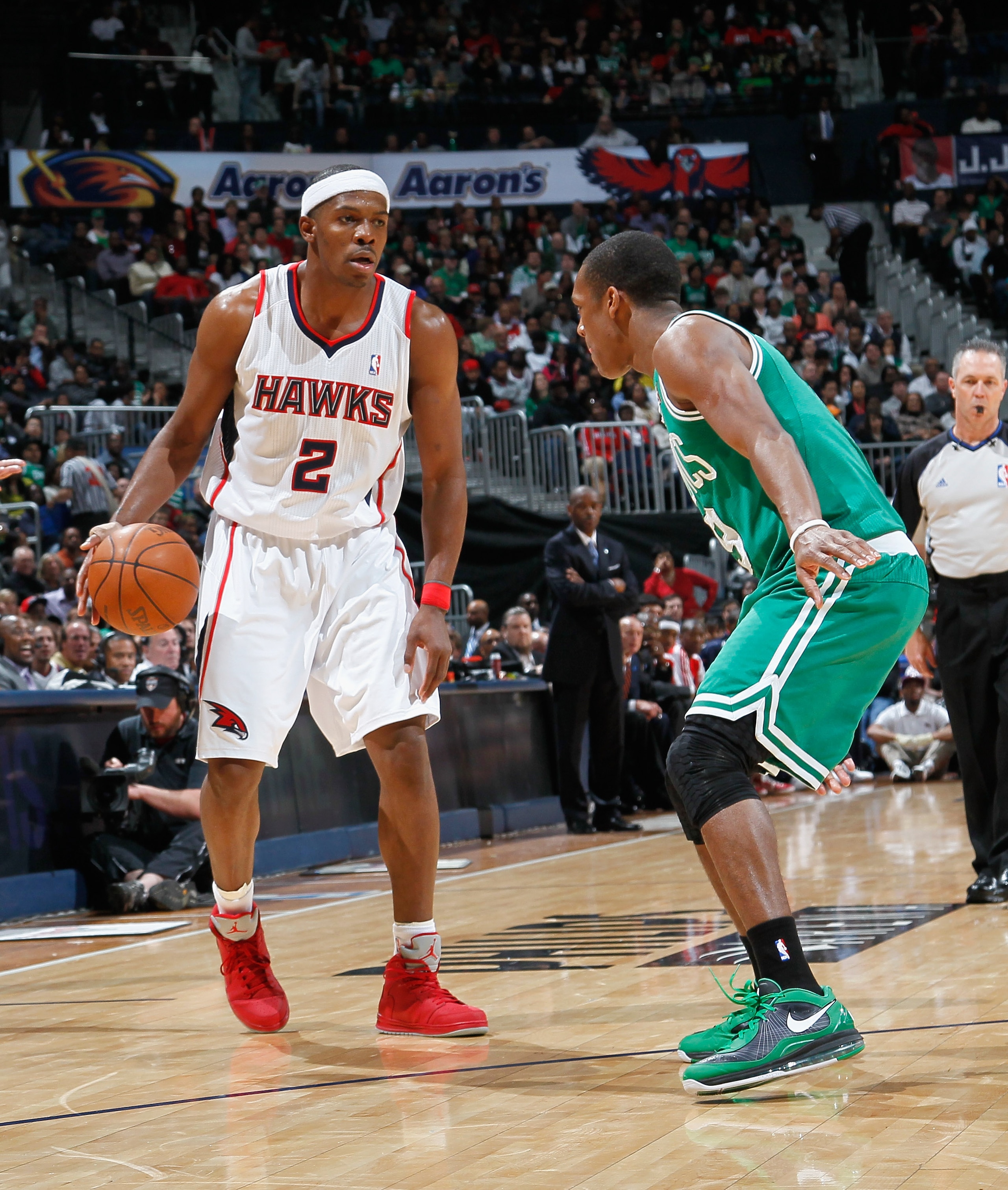 ATLANTA, GA - APRIL 01: Joe Johnson #2 of the Atlanta Hawks against Rajon Rondo #9 of the Boston Celtics at Philips Arena on April 1, 2011 in Atlanta, Georgia. NOTE TO USER: User expressly acknowledges and agrees that, by downloading and/or using this P ATLANTA, GA - APRIL 01: Joe Johnson #2 of the Atlanta Hawks against Rajon Rondo #9 of the Boston Celtics at Philips Arena on April 1, 2011 in Atlanta, Georgia. NOTE TO USER: User expressly acknowledges and agrees that, by downloading and/or using this P