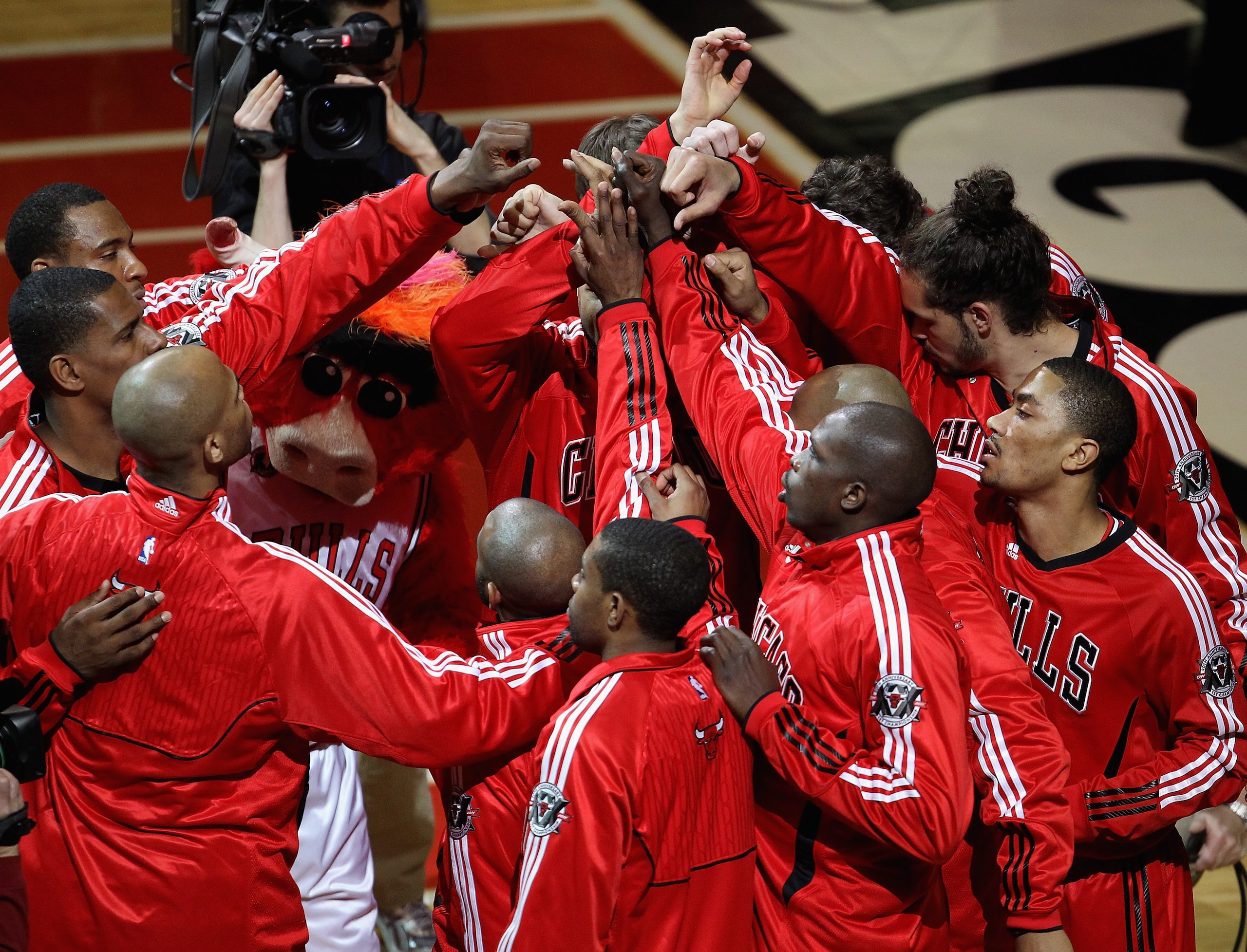 CHICAGO, IL - APRIL 13: The Chicago Bulls huddle before a game against the New Jersey Nets at the United Center on April 13, 2011 in Chicago, Illinois. The Bulls defeated the Nets 97-92. NOTE TO USER: User expressly acknowledges and agress that, by downlo CHICAGO, IL - APRIL 13: The Chicago Bulls huddle before a game against the New Jersey Nets at the United Center on April 13, 2011 in Chicago, Illinois. The Bulls defeated the Nets 97-92. NOTE TO USER: User expressly acknowledges and agress that, by downlo