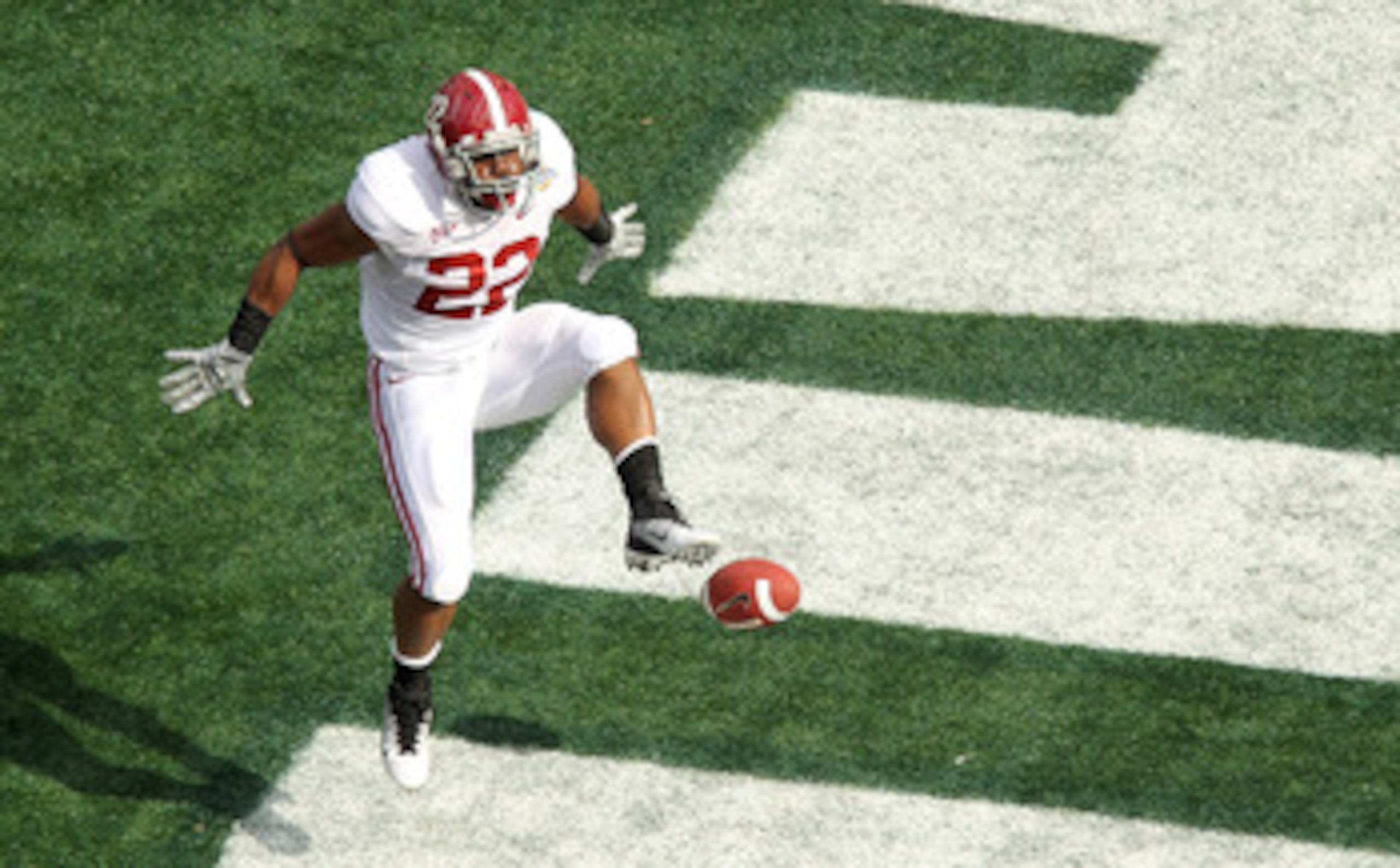 ORLANDO, FL - JANUARY 01: Mark Ingram #22 of the Alabama Crimson Tide scores a touchdown during the Capitol One Bowl against the Michigan State Spartans at the Florida Citrus Bowl on January 1, 2011 in Orlando, Florida. (Photo by Mike Ehrmann/Getty Image ORLANDO, FL - JANUARY 01: Mark Ingram #22 of the Alabama Crimson Tide scores a touchdown during the Capitol One Bowl against the Michigan State Spartans at the Florida Citrus Bowl on January 1, 2011 in Orlando, Florida. (Photo by Mike Ehrmann/Getty Image