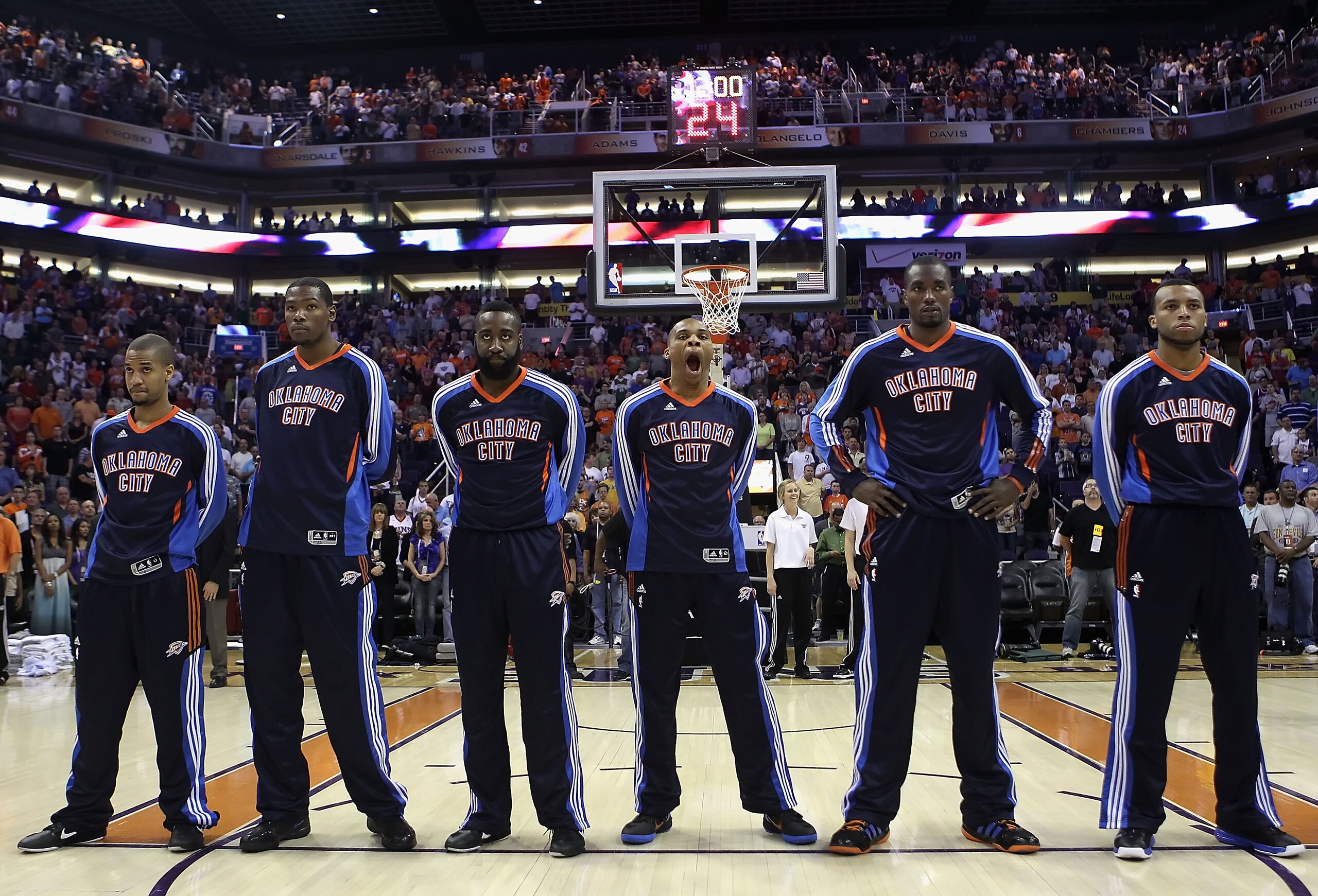 PHOENIX, AZ - MARCH 30: The Oklahoma City Thunder stand attended before the NBA game against the Phoenix Suns at US Airways Center on March 30, 2011 in Phoenix, Arizona. The Thunder defeated the Suns 116-98. NOTE TO USER: User expressly acknowledges an PHOENIX, AZ - MARCH 30: The Oklahoma City Thunder stand attended before the NBA game against the Phoenix Suns at US Airways Center on March 30, 2011 in Phoenix, Arizona. The Thunder defeated the Suns 116-98. NOTE TO USER: User expressly acknowledges an