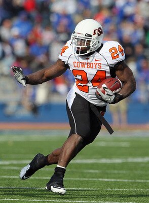 LAWRENCE, KS - NOVEMBER 20:  Running back Kendall Hunter #24 of the Oklahoma State Cowboys carries the ball during the game against the Kansas Jayhawks on November 20, 2010 at Memorial Stadium in Lawrence, Kansas.  (Photo by Jamie Squire/Getty Images)
