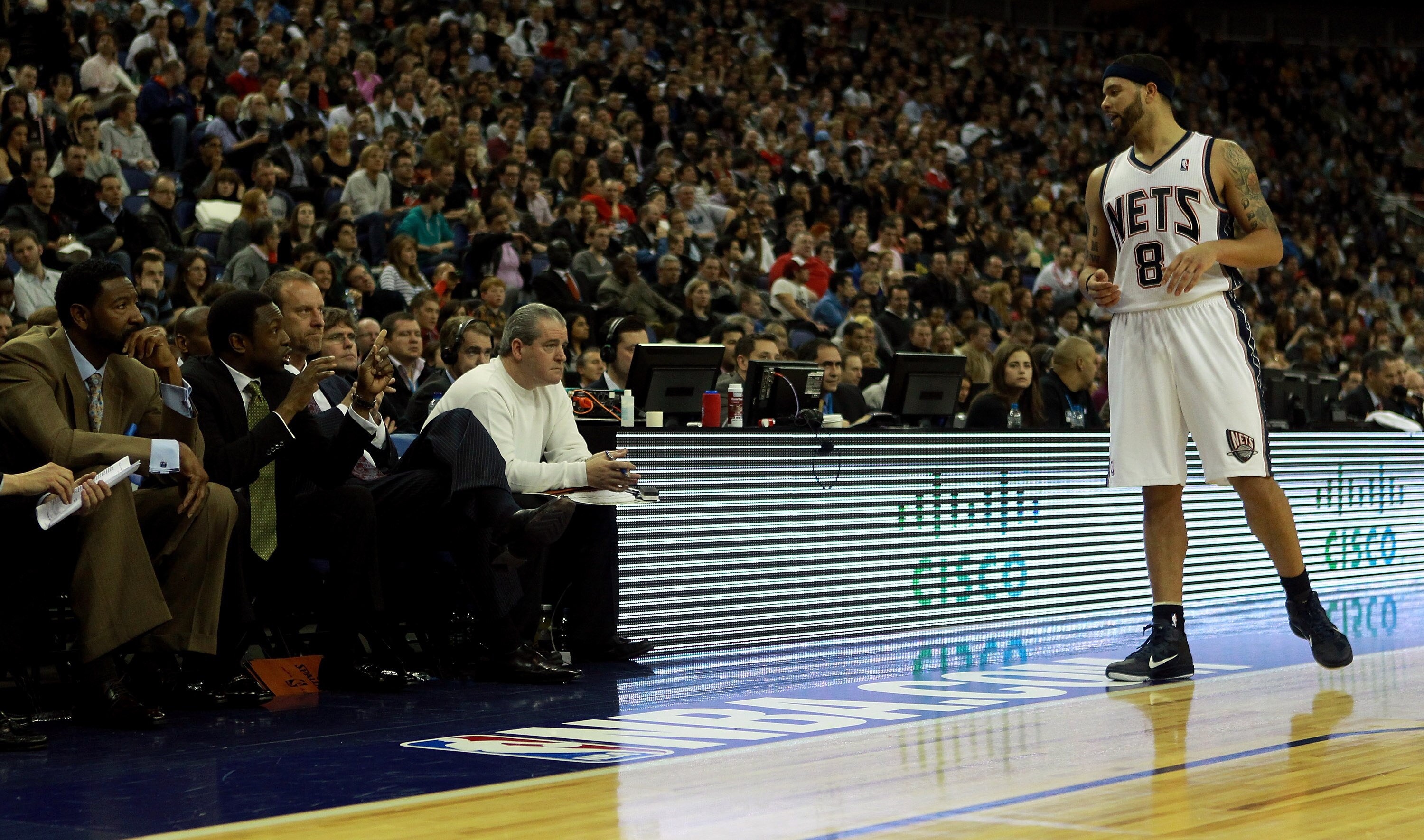 LONDON, ENGLAND - MARCH 04:  #8 Deron Williams of the Nets speaks with his coach, Avery Johnson during the NBA match between New Jersey Nets and the Toronto Raptors at the O2 Arena on March 4, 2011 in London, England. NOTE TO USER: User expressly acknowle