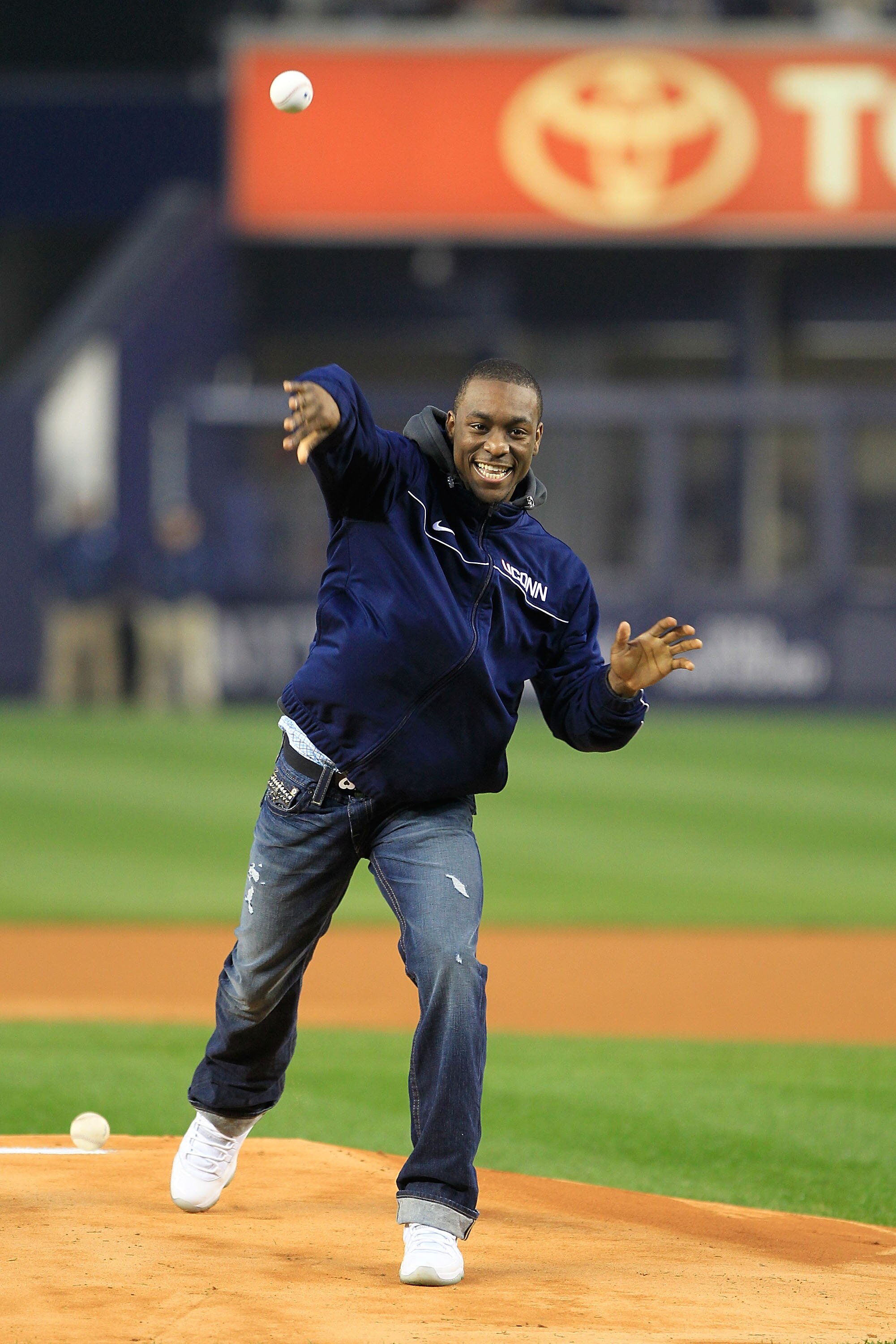 NEW YORK, NY - APRIL 13: Kemba Walker, guard for the Connecticut Huskies throws out the first pitch before the game between the New York Yankees and the Baltimore Orioles at Yankee Stadium on April 13, 2011 in the Bronx borough of New York City.  (Photo b