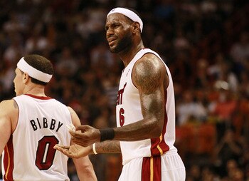 MIAMI, FL - MARCH 25:  Forward LeBron James #6 of the Miami Heat reacts  against the Philadelphia 76ers at American Airlines Arena on March 25, 2011 in Miami, Florida. The Heat defeated the Sixers 111-99. NOTE TO USER: User expressly acknowledges and agre