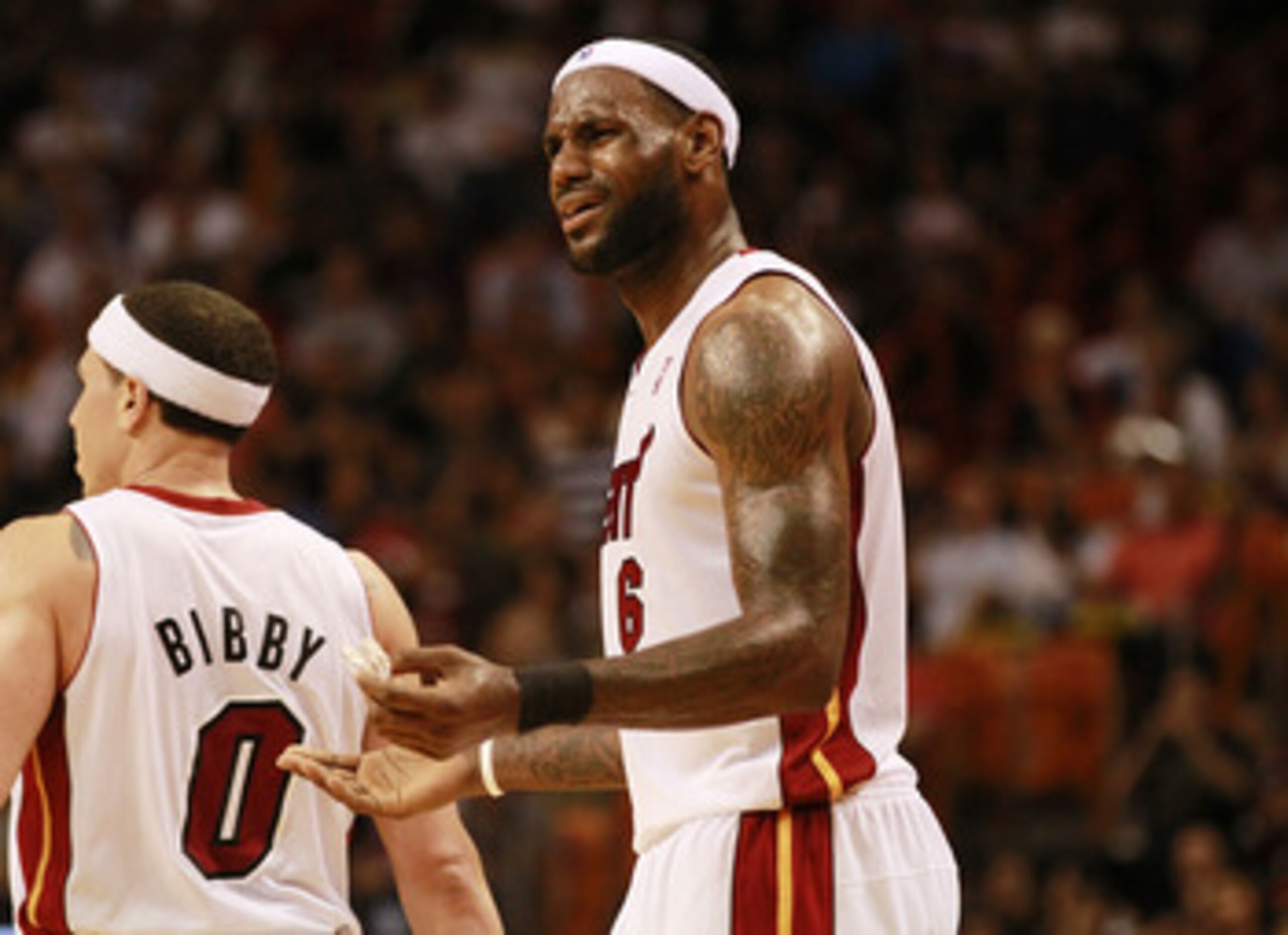 MIAMI, FL - MARCH 25:  Forward LeBron James #6 of the Miami Heat reacts  against the Philadelphia 76ers at American Airlines Arena on March 25, 2011 in Miami, Florida. The Heat defeated the Sixers 111-99. NOTE TO USER: User expressly acknowledges and agre