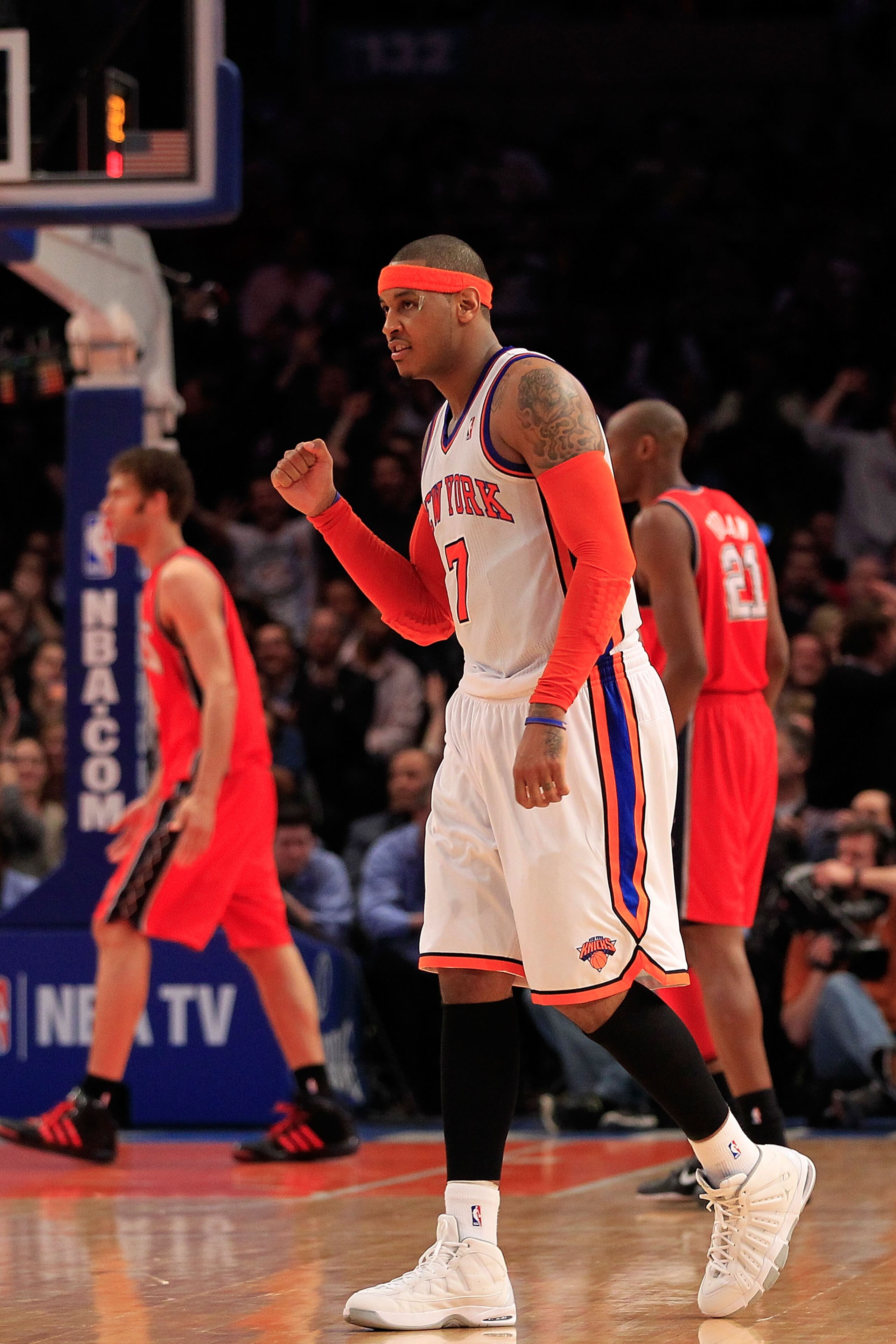 NEW YORK, NY - MARCH 30: Carmelo Anthony #7 of the New York Knicks celebrates during the game against the New Jersey Nets at Madison Square Garden on March 30, 2011 in New York City. NOTE TO USER: User expressly acknowledges and agrees that, by downloadi NEW YORK, NY - MARCH 30: Carmelo Anthony #7 of the New York Knicks celebrates during the game against the New Jersey Nets at Madison Square Garden on March 30, 2011 in New York City. NOTE TO USER: User expressly acknowledges and agrees that, by downloadi