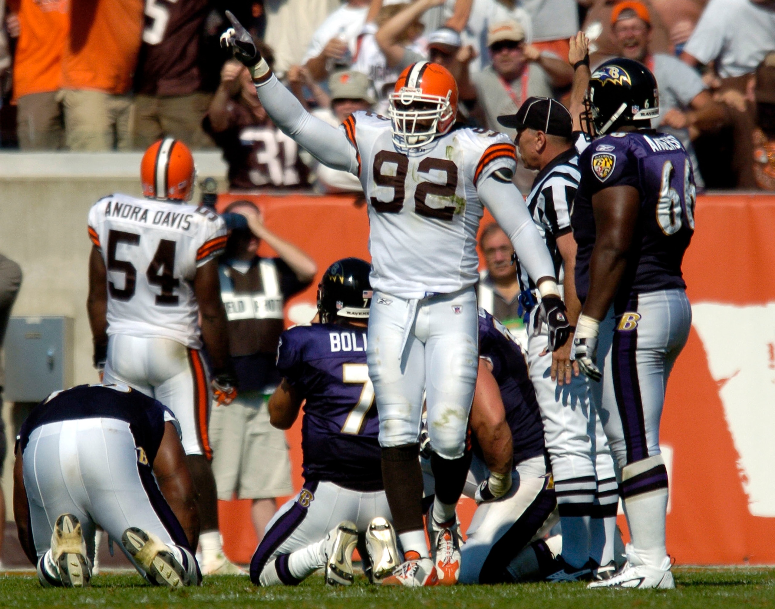 CLEVELAND, OH - SEPTEMBER 12:  Courtney Brown #92 of the Cleveland Browns celebrates a Baltimore turnover near the goal line that would set up a Cleveland score in the fourth quarter on September 12, 2004 at Cleveland Browns Stadium in Cleveland, Ohio.  C
