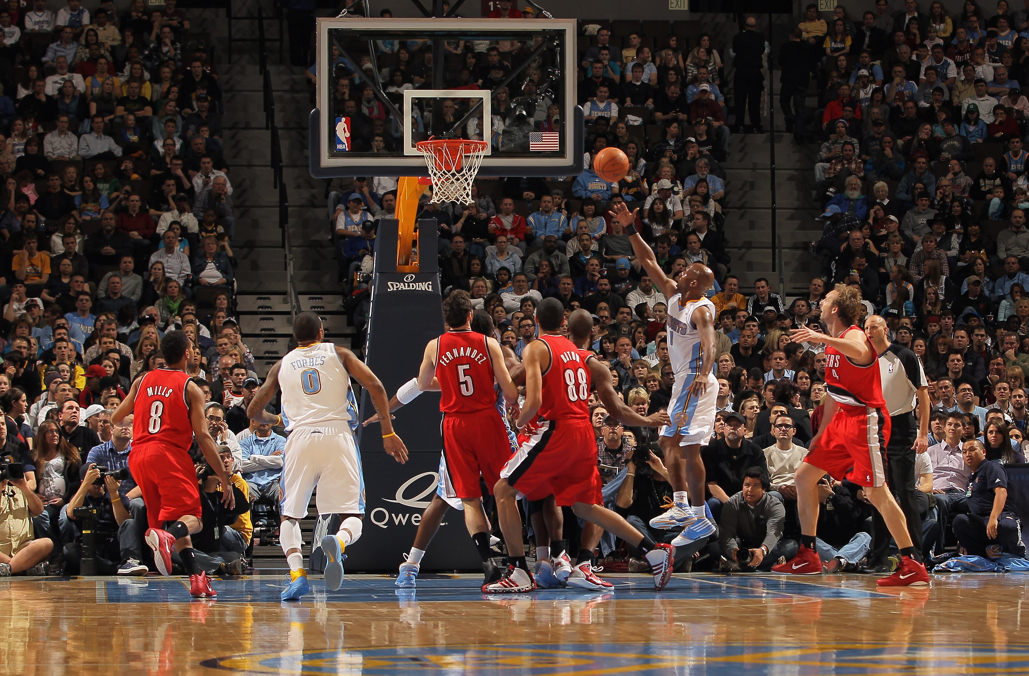DENVER - DECEMBER 28:  Chauncey Billups #1 of the Denver Nuggets lays up a shot against the Portland Trail Blazers at Pepsi Center on December 28, 2010 in Denver, Colorado. The Nuggets defeated the Blazers 95-77. NOTE TO USER: User expressly acknowledges