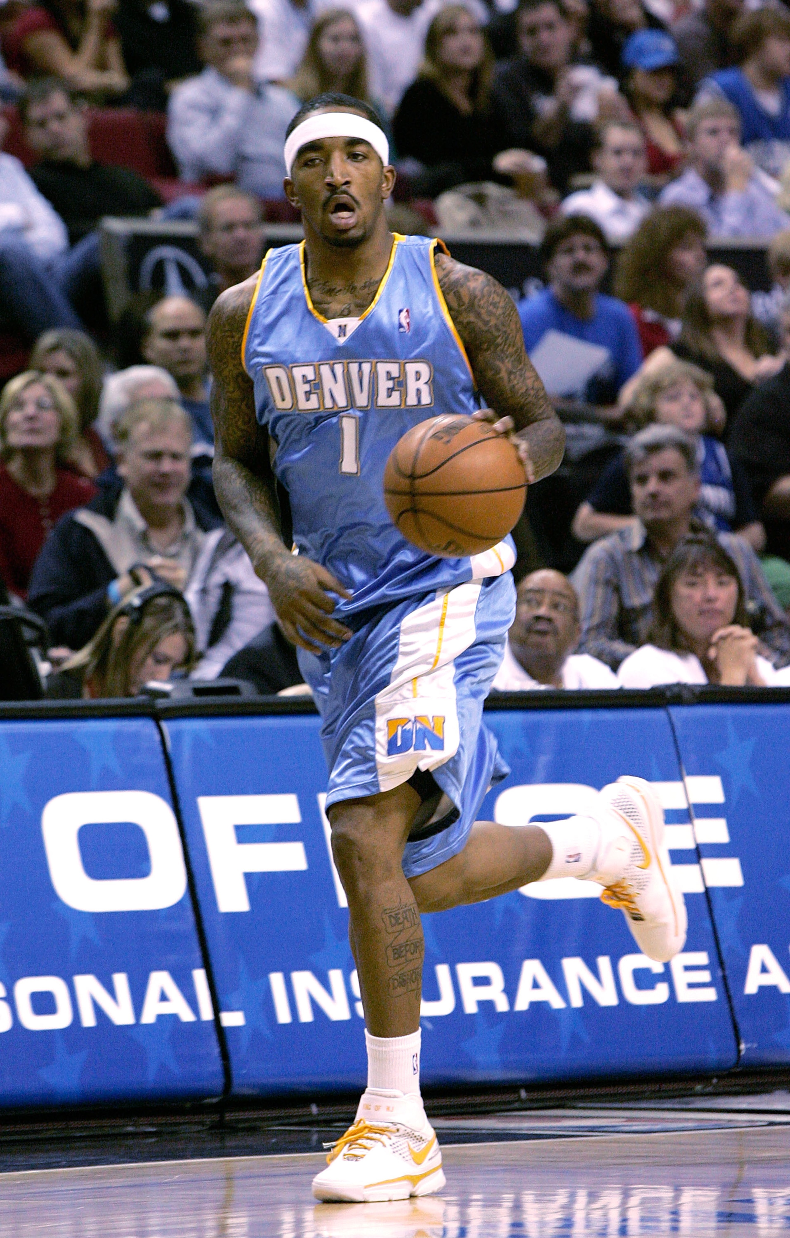 ORLANDO, FL - FEBRUARY 13:  J.R. Smith, #1 of the Denver Nuggets, sets up the offense in a game against the Orlando Magic at Amway Arena on February 13, 2008 in Orlando Florida. NOTE TO USER: User expressly acknowledges and agrees that, by downloading and