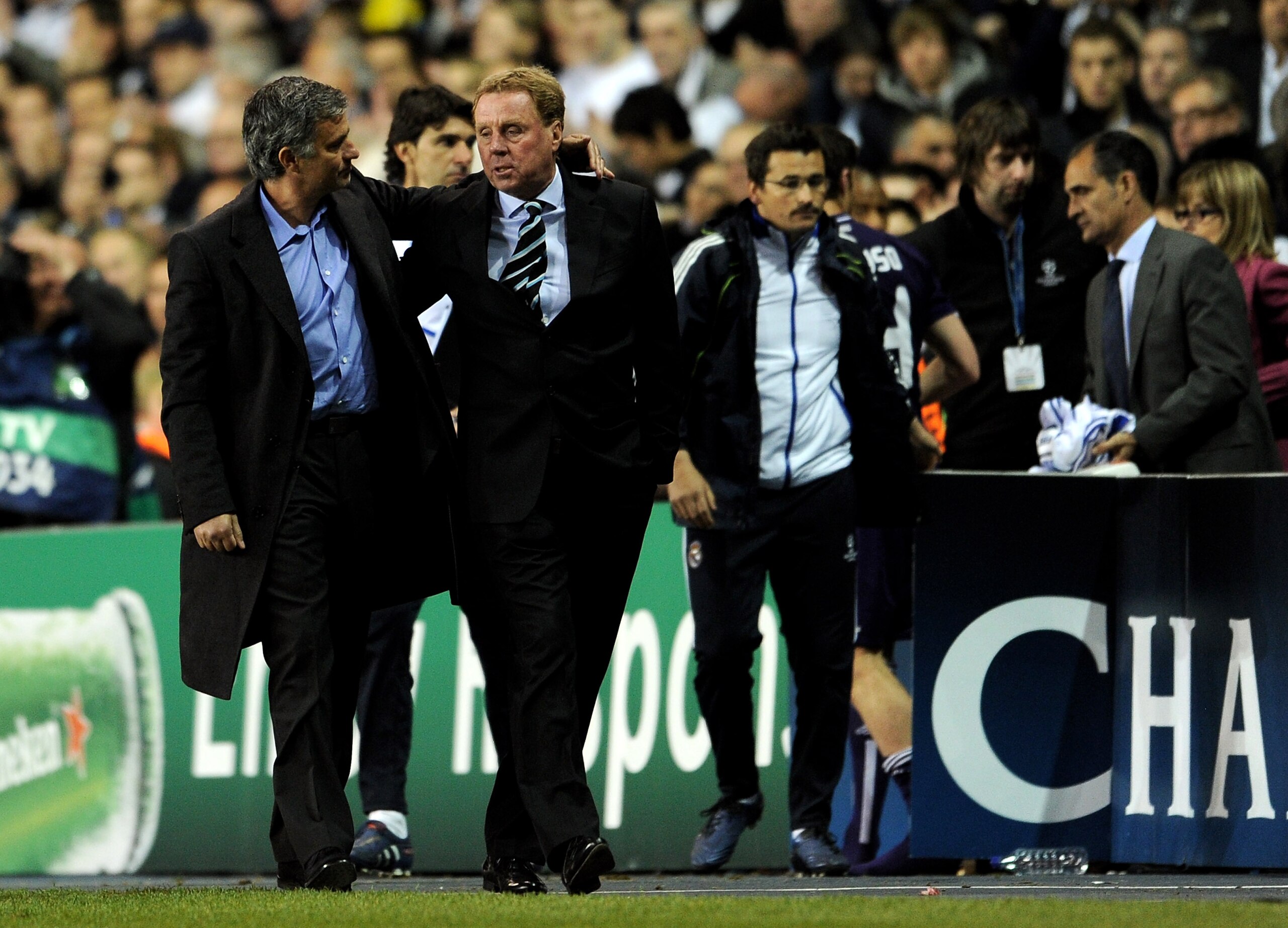 LONDON, ENGLAND - APRIL 13:  Manager Jose Mourinho speaks to Harry Redknapp of Spurs during the UEFA Champions League quarter final second leg match between Tottenham Hotspur and Real Madrid at White Hart Lane on April 13, 2011 in London, England.  (Photo