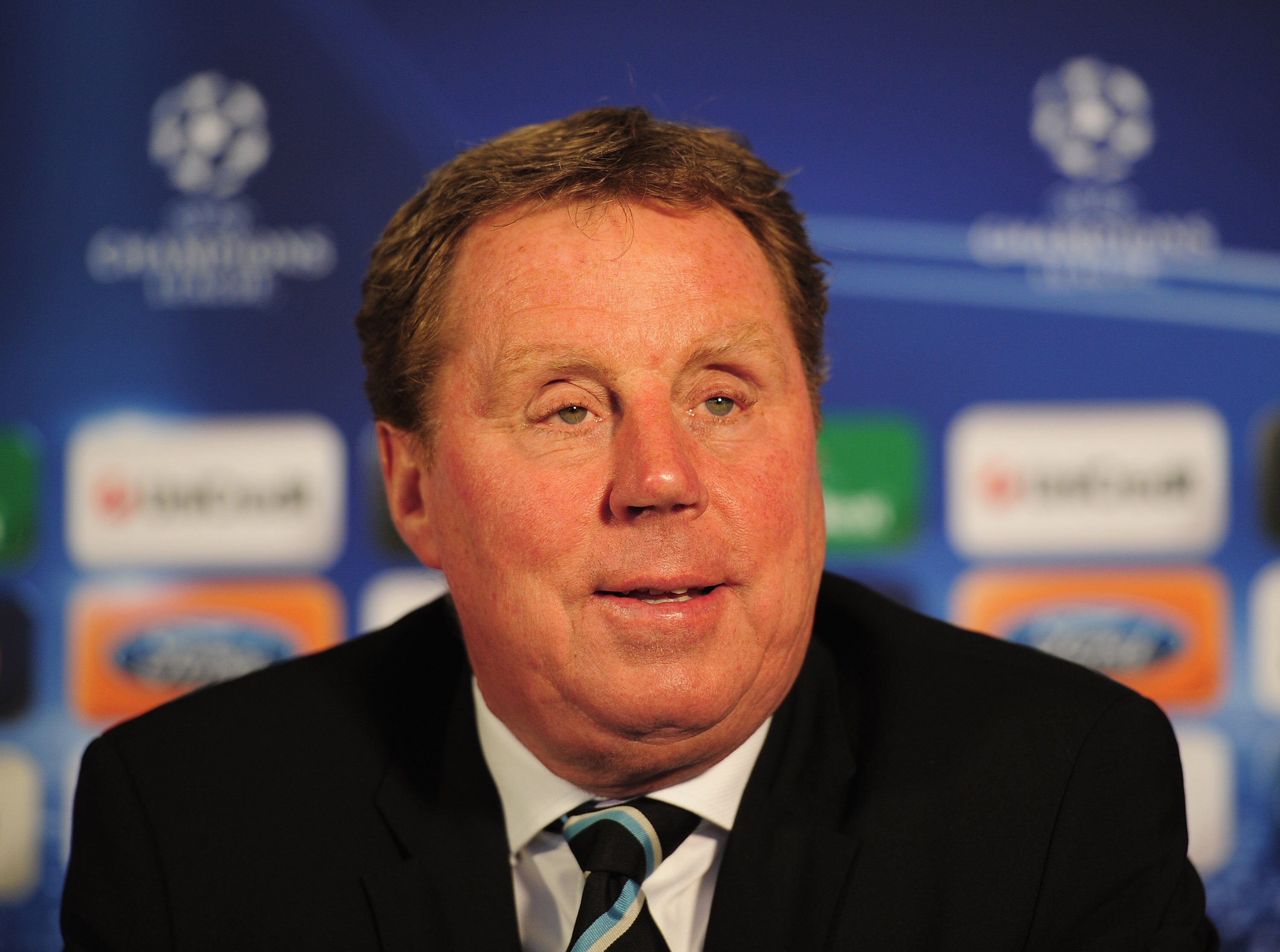 LONDON, ENGLAND - APRIL 12:  Tottenham Hotspur manager Harry Rednapp talks to the media during a press conference on the eve of their UEFA Champions League quarter-final second leg match against Real Madrid at White Hart Lane on April 12, 2011 in London,