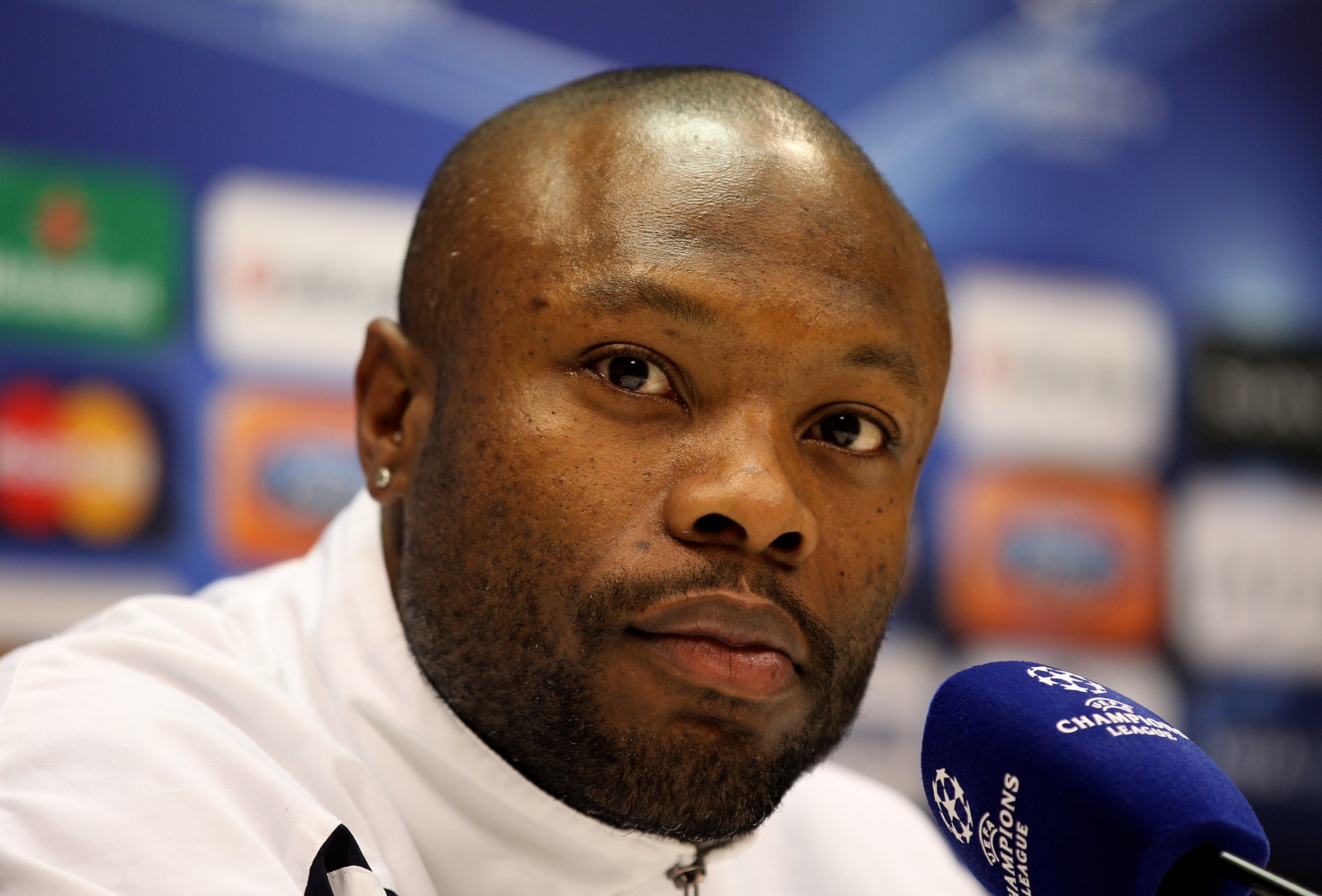 MILAN, ITALY - FEBRUARY 14:  William Gallas of Tottenham Hotspur answers questions during a press conference on the day before the UEFA Champions League Round of 16, 1st leg match between AC Milan and Tottenham Hotspur at the San Siro Stadium on February