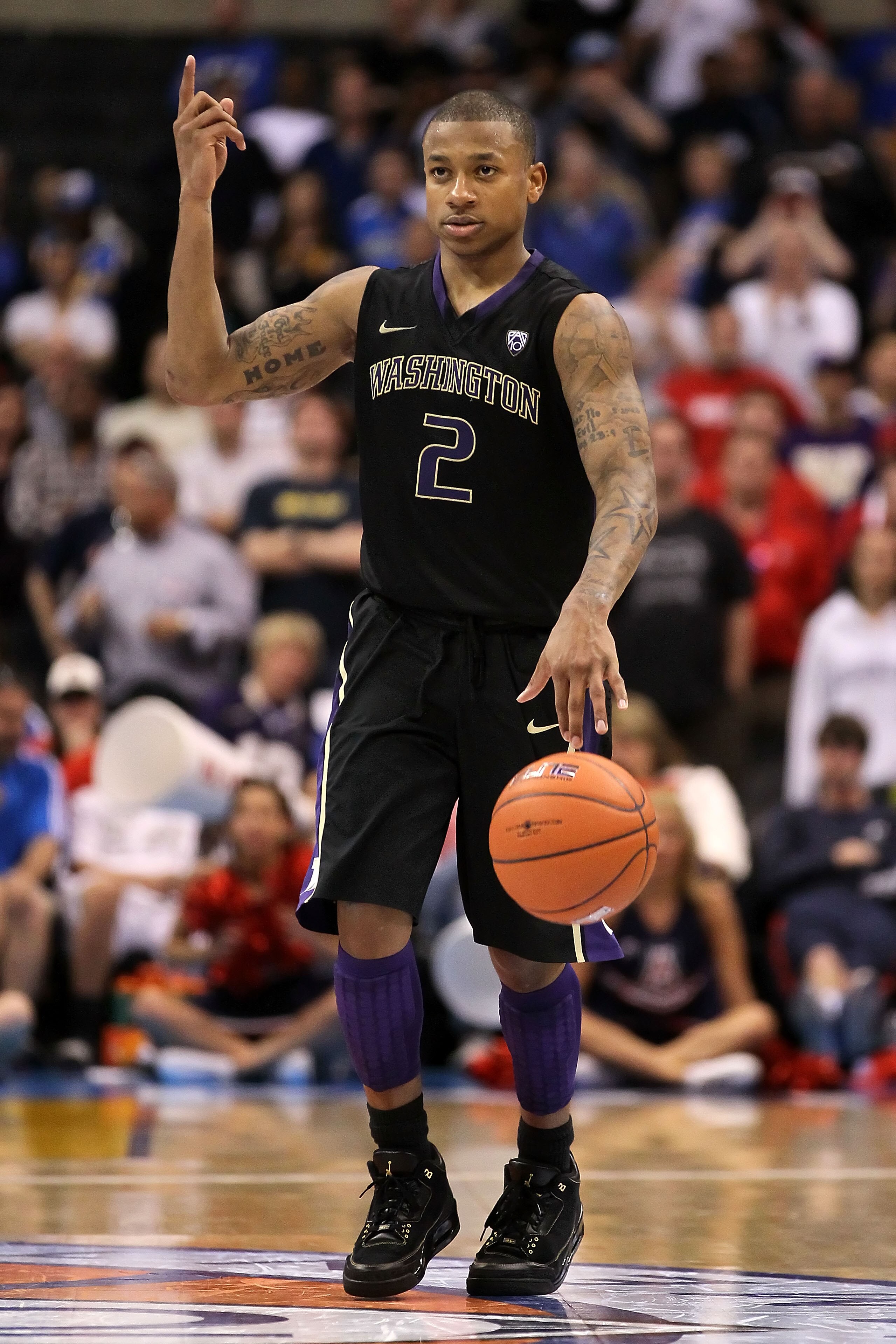 LOS ANGELES, CA - MARCH 12:  Isaiah Thomas #2 of the Washington Huskies moves the ball while taking on the Arizona Wildcats in the championship game of the 2011 Pacific Life Pac-10 Men's Basketball Tournament at Staples Center on March 12, 2011 in Los Ang