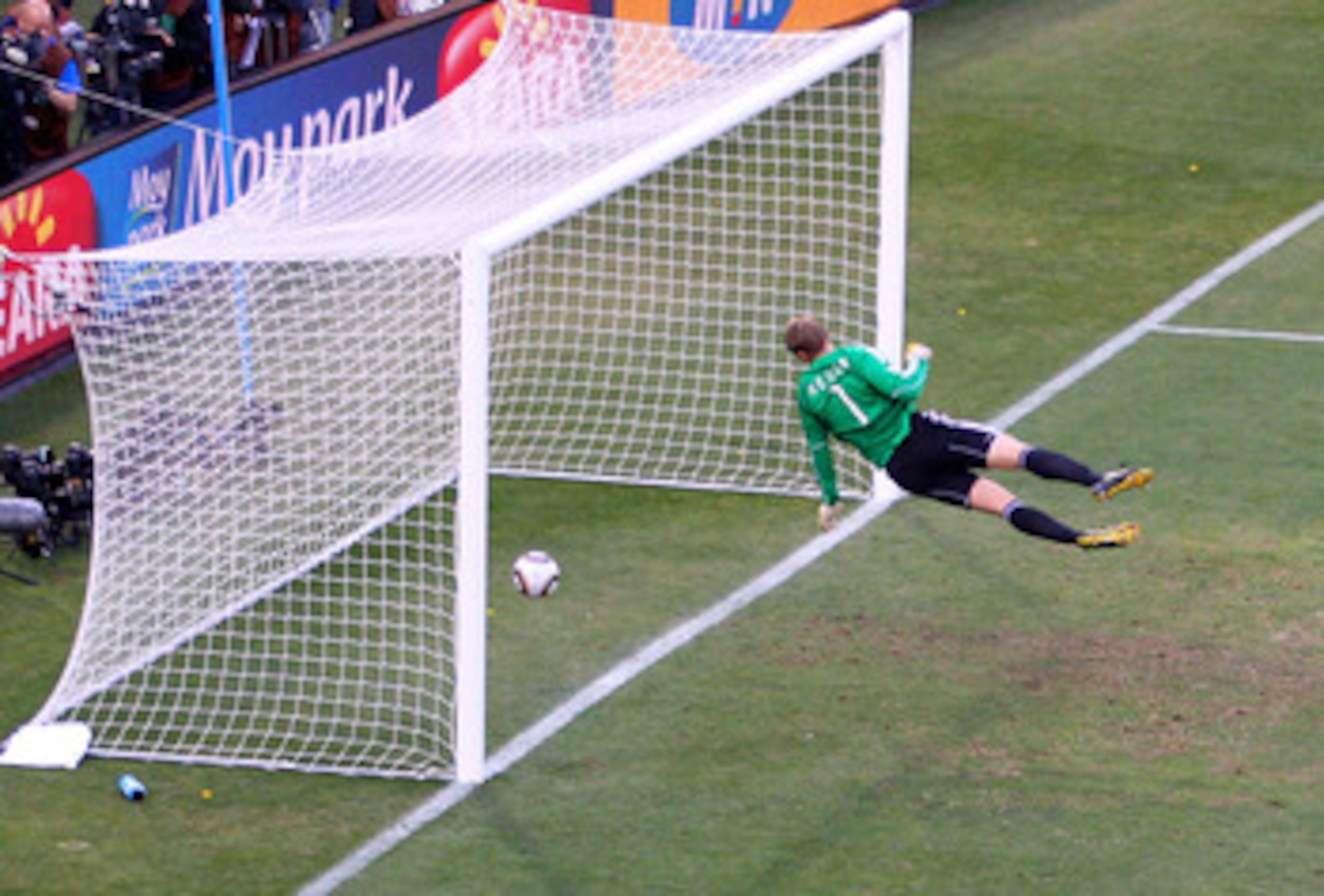 BLOEMFONTEIN, SOUTH AFRICA - JUNE 27: Manuel Neuer of Germany watches the ball bounce over the line from a shot that hit the crossbar from Frank Lampard of England, but referee Jorge Larrionda judges the ball did not cross the line during the 2010 FIFA W BLOEMFONTEIN, SOUTH AFRICA - JUNE 27: Manuel Neuer of Germany watches the ball bounce over the line from a shot that hit the crossbar from Frank Lampard of England, but referee Jorge Larrionda judges the ball did not cross the line during the 2010 FIFA W