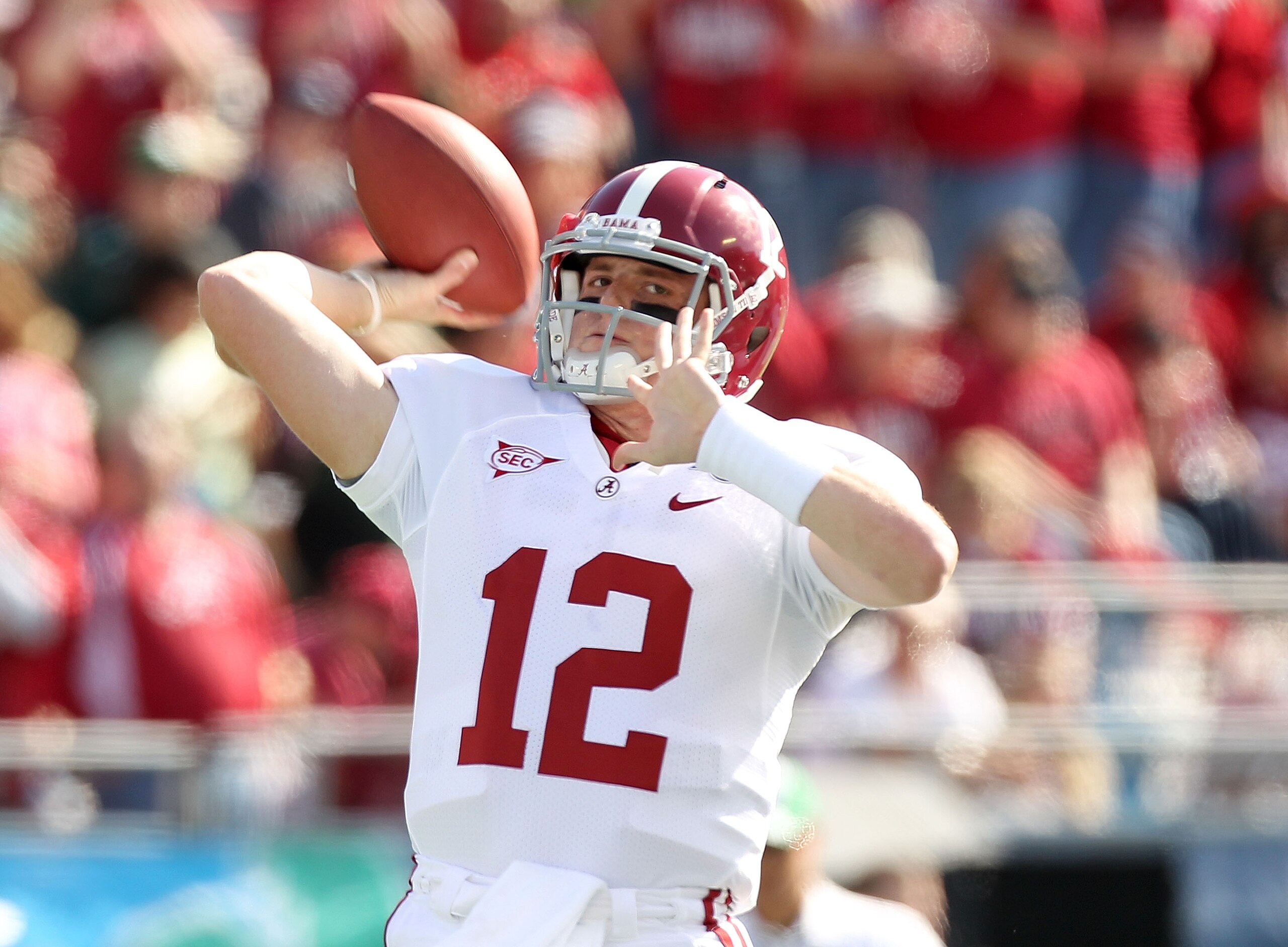 ORLANDO, FL - JANUARY 01:  Greg McElroy #12 of the Alabama Crimson Tide warms up during the Capitol One Bowl against the Michigan State Spartans at the Florida Citrus Bowl on January 1, 2011 in Orlando, Florida.  (Photo by Mike Ehrmann/Getty Images)