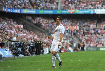 BILBAO, SPAIN - APRIL 09:  Cristiano Ronaldo of Real Madrid celebrates after scoring Real's third goal  during the La Liga match between Athletic Bilbao and Real Madrid at San Mames Stadium on April 9, 2011 in Bilbao, Spain.  (Photo by Denis Doyle/Getty I