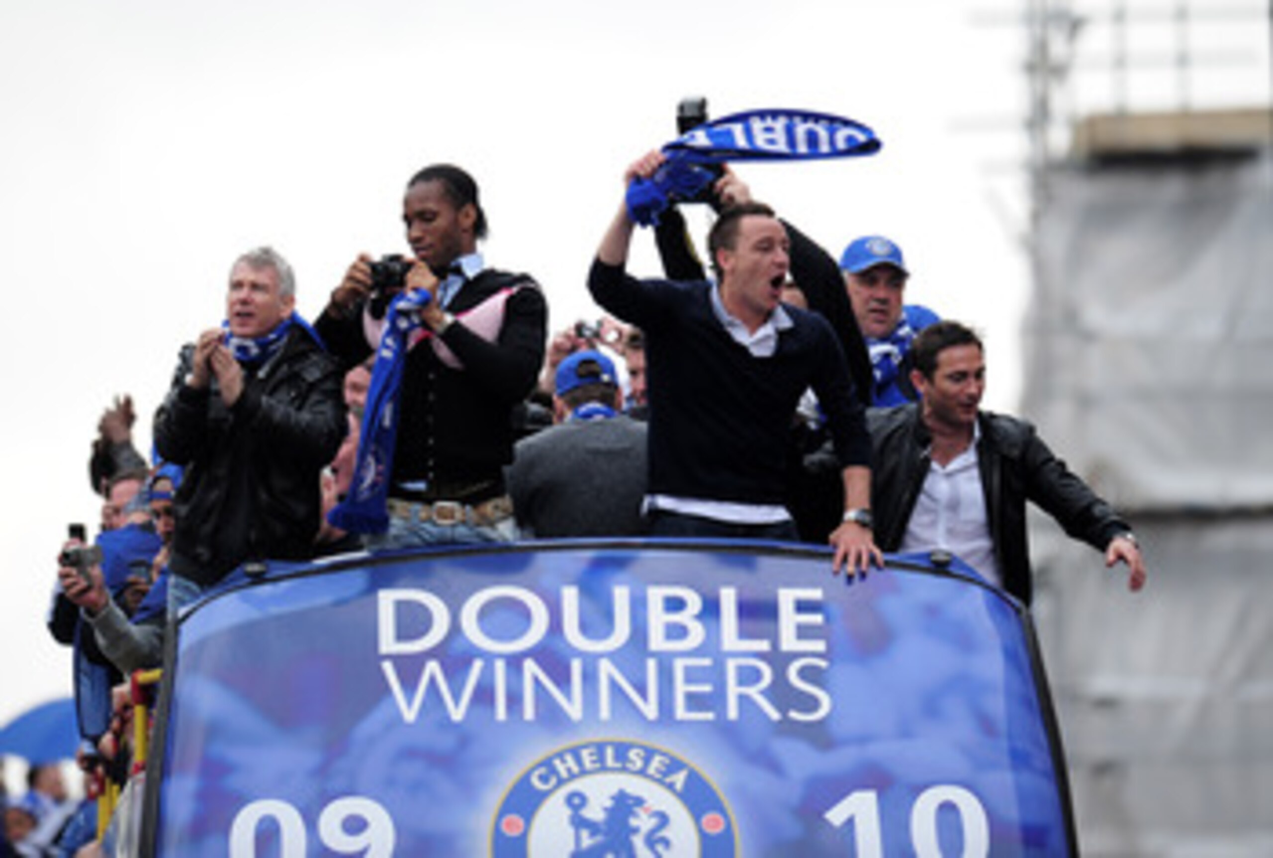 LONDON, ENGLAND - MAY 16: Chelsea captain John Terry and Didier Drogba celebrate during the Chelsea FC Victory Parade on May 16, 2010 in London, England. (Photo by Shaun Botterill/Getty Images) LONDON, ENGLAND - MAY 16: Chelsea captain John Terry and Didier Drogba celebrate during the Chelsea FC Victory Parade on May 16, 2010 in London, England. (Photo by Shaun Botterill/Getty Images)