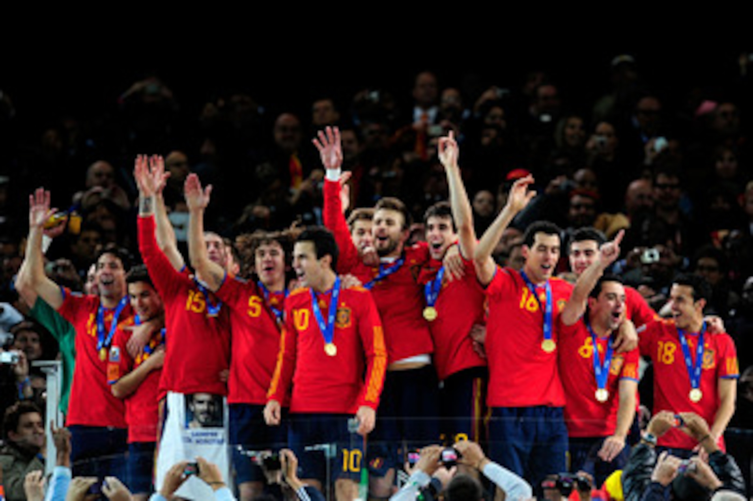 JOHANNESBURG, SOUTH AFRICA - JULY 11: The Spain team celebrate winning the World Cup during the 2010 FIFA World Cup South Africa Final match between Netherlands and Spain at Soccer City Stadium on July 11, 2010 in Johannesburg, South Africa. (Photo by J JOHANNESBURG, SOUTH AFRICA - JULY 11: The Spain team celebrate winning the World Cup during the 2010 FIFA World Cup South Africa Final match between Netherlands and Spain at Soccer City Stadium on July 11, 2010 in Johannesburg, South Africa. (Photo by J