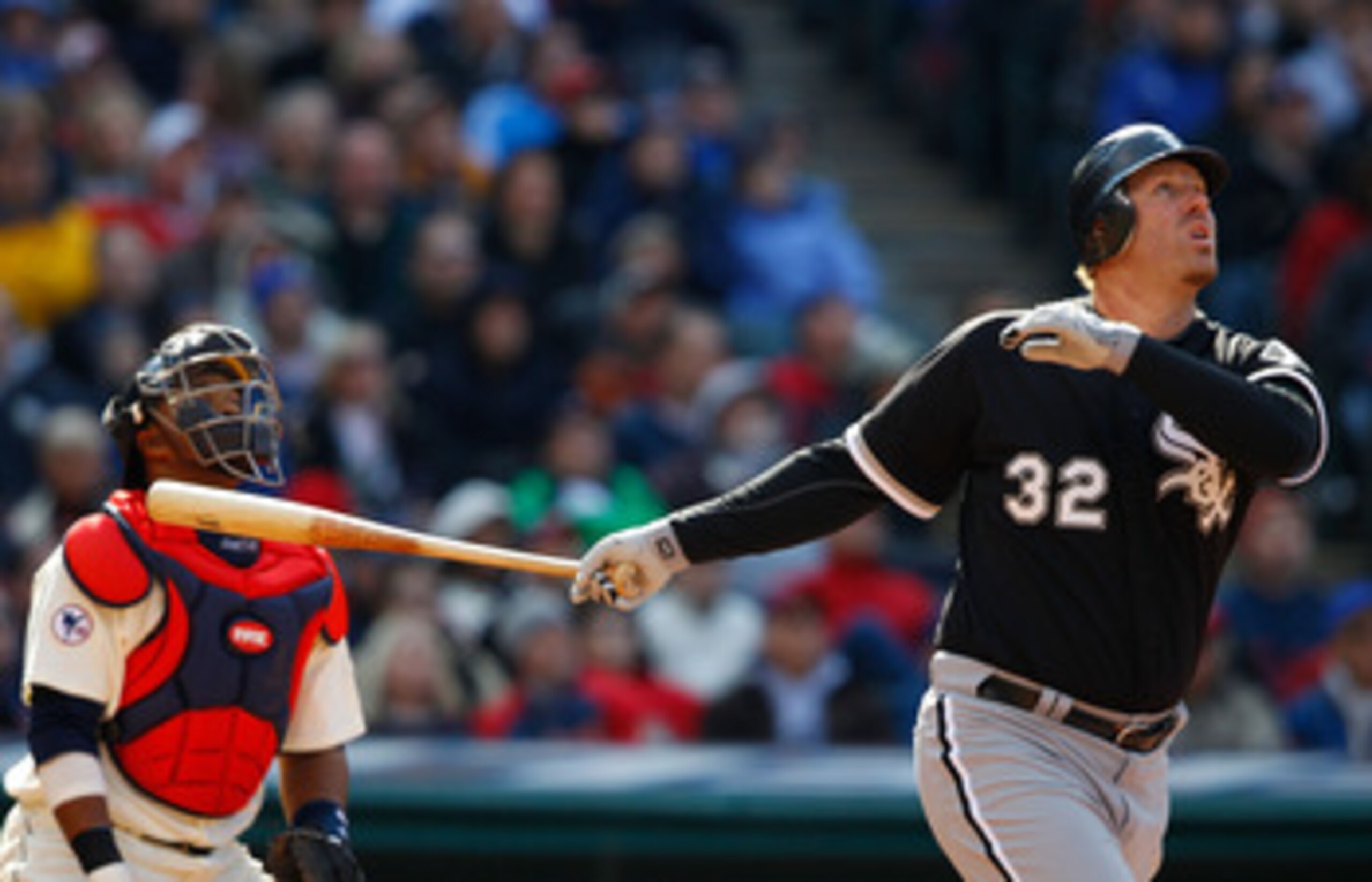 CLEVELAND - APRIL 01:  Adam Dunn #32 of the Chicago White Sox hits a two-run home run agains the Cleveland Indians during the Opening Day game on April 1, 2011 at Progressive Field in Cleveland, Ohio.  (Photo by Jared Wickerham/Getty Images)