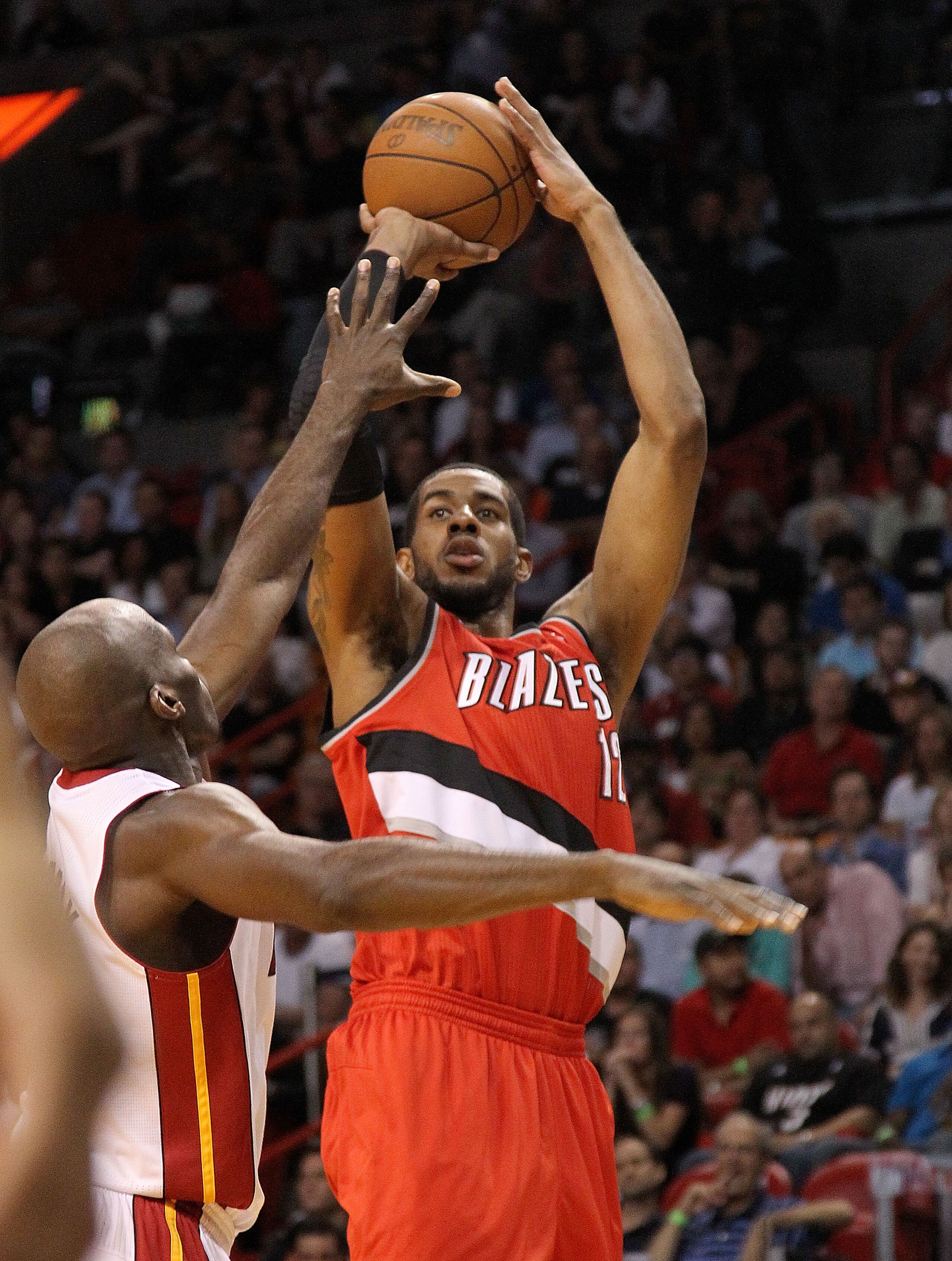 MIAMI, FL - MARCH 08: LaMarcus Aldridge #12 of the Portland Trail Blazers shoots over Joel Anthony #50 of the Miami Heat during a game at American Airlines Arena on March 8, 2011 in Miami, Florida. NOTE TO USER: User expressly acknowledges and agrees tha MIAMI, FL - MARCH 08: LaMarcus Aldridge #12 of the Portland Trail Blazers shoots over Joel Anthony #50 of the Miami Heat during a game at American Airlines Arena on March 8, 2011 in Miami, Florida. NOTE TO USER: User expressly acknowledges and agrees tha