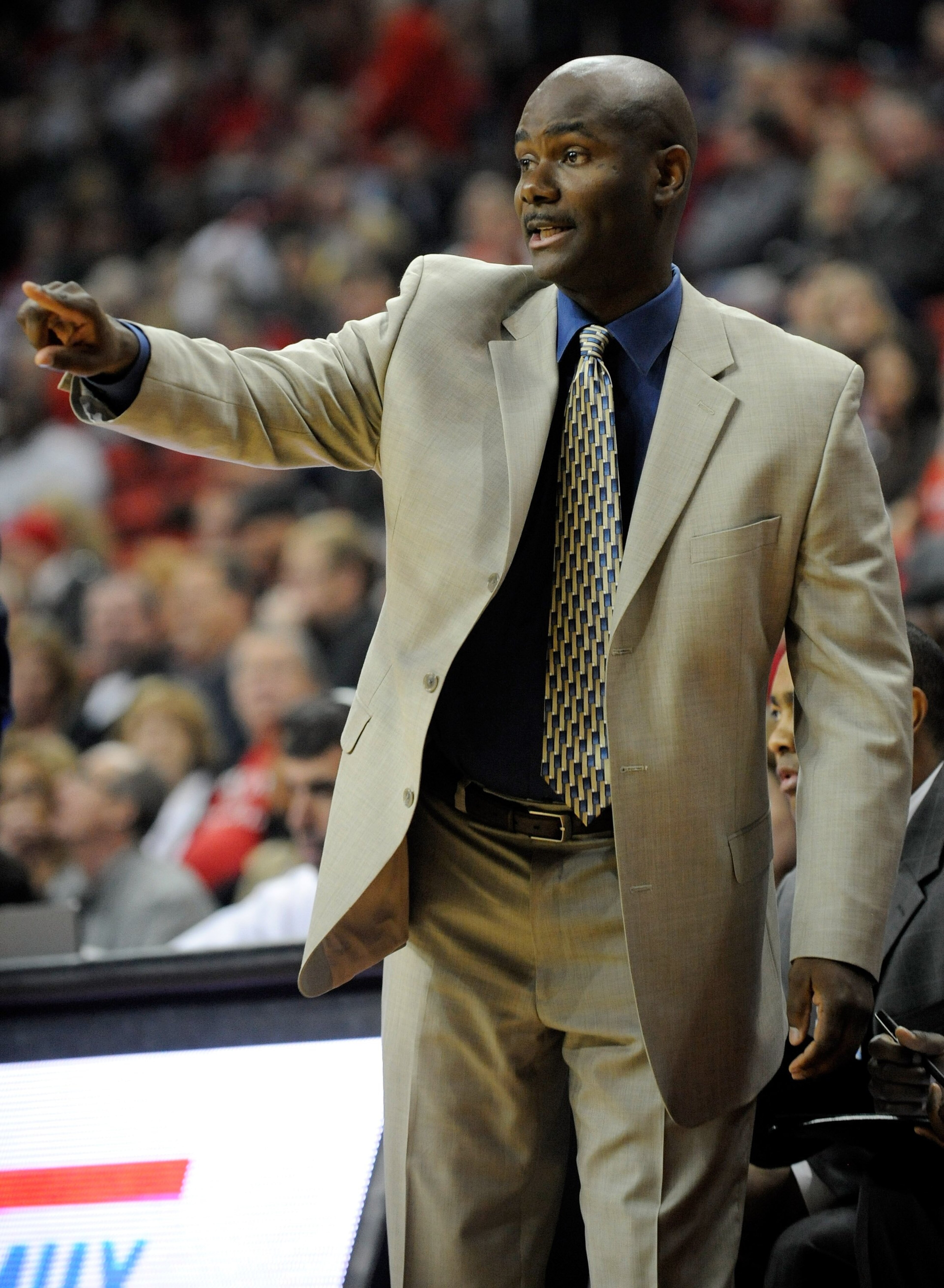 LAS VEGAS - NOVEMBER 18: Head coach David Carter of the Nevada Wolf Pack talks to his players during their game against the UNLV Rebels at the Thomas & Mack Center on November 18, 2009 in Las Vegas, Nevada. UNLV won 88-75. (Photo by Ethan Miller/Getty I LAS VEGAS - NOVEMBER 18: Head coach David Carter of the Nevada Wolf Pack talks to his players during their game against the UNLV Rebels at the Thomas & Mack Center on November 18, 2009 in Las Vegas, Nevada. UNLV won 88-75. (Photo by Ethan Miller/Getty I