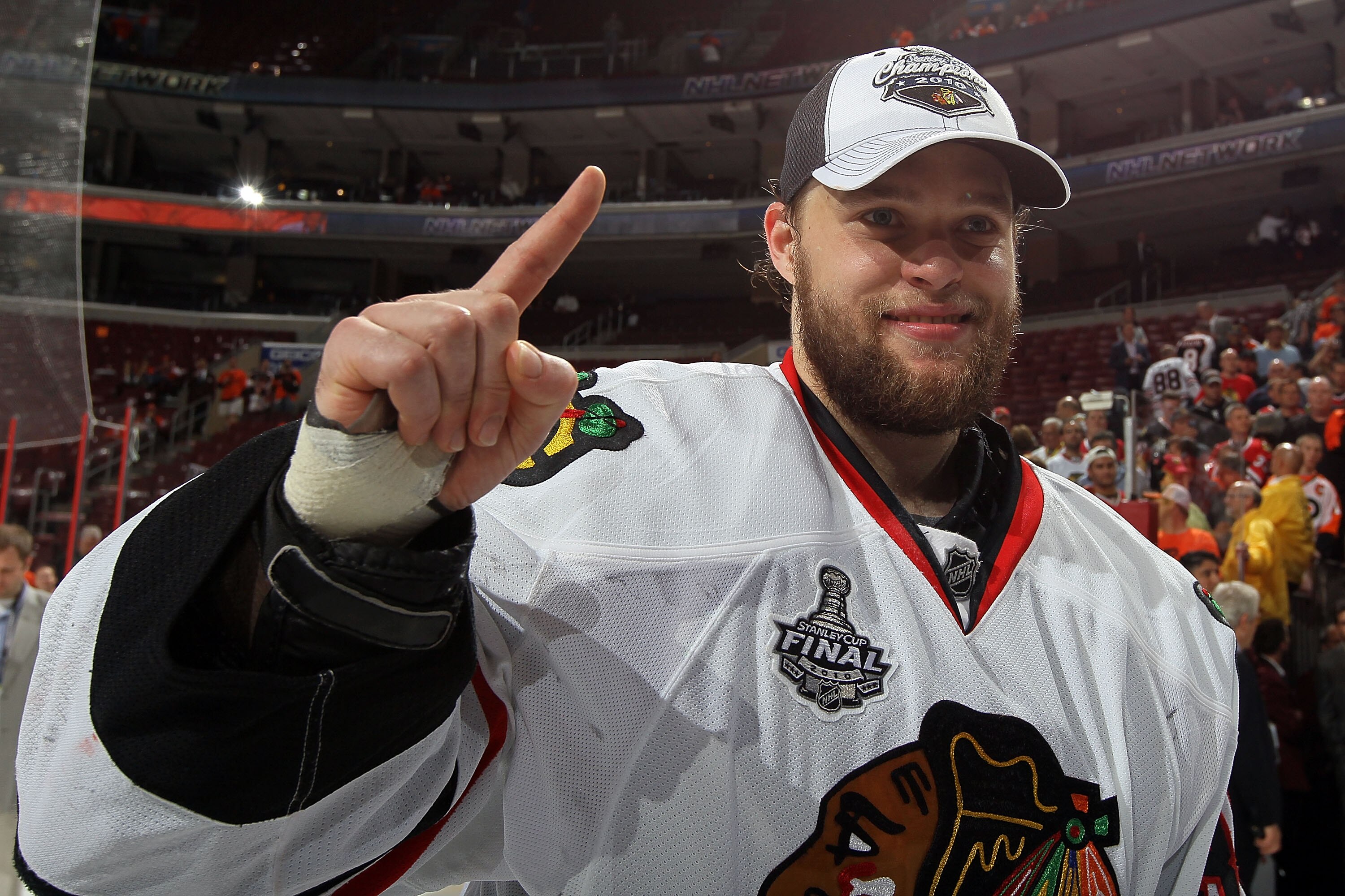 PHILADELPHIA - JUNE 09:  Antti Niemi #31 of the Chicago Blackhawks hoists the Stanley Cup after teammate Patrick Kane #88 scored the game-winning goal in overtime to defeat the Philadelphia Flyers 4-3 and win the Stanley Cup in Game Six of the 2010 NHL St