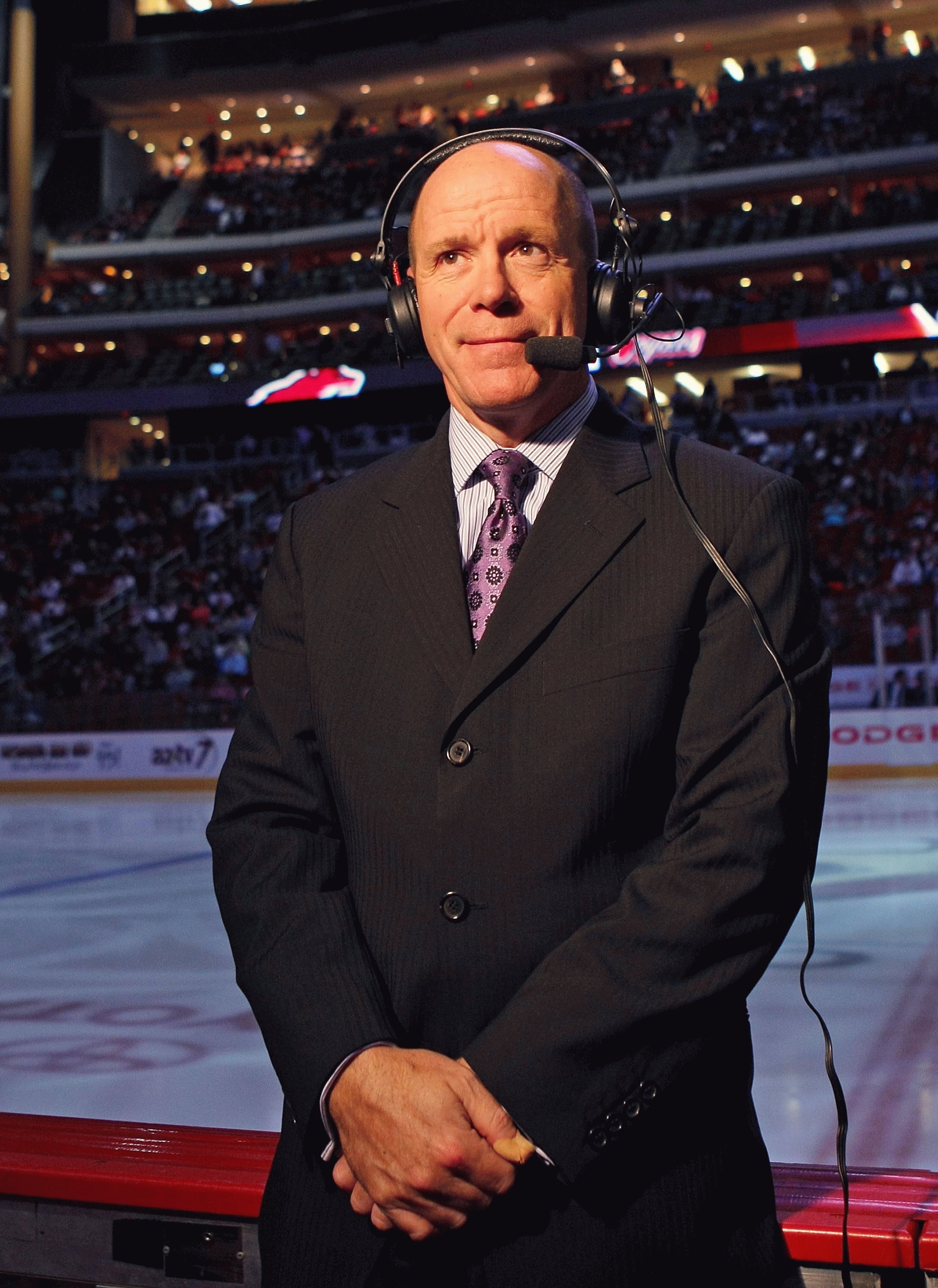 GLENDALE, AZ - FEBRUARY 28: Broadcaster Darren Pang waits for the action to begin prior to the game between the Phoenix Coyotes and the St. Louis Blues on February 28, 2009 at the Jobing.com Arena in Glendale, Arizona. (Photo by Bruce Bennett/Getty Images