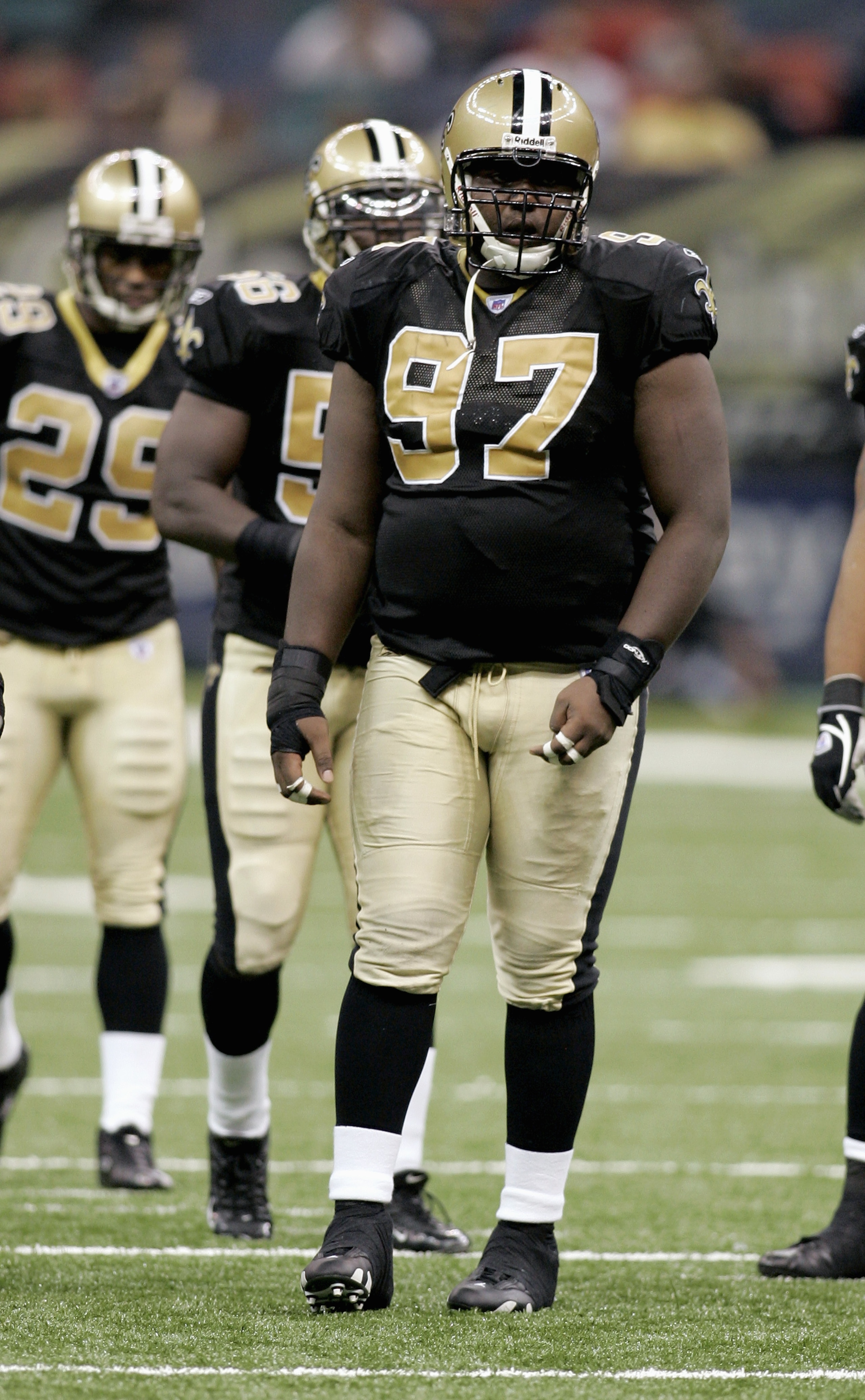 NEW ORLEANS - AUGUST 12:  Defensive tackle Johnathan Sullivan #97 of the New Orleans Saints gets into position during the preseason game against the Seattle Seahawks on August 12, 2005 at the Superdome in New Orleans, Louisiana.  The Seahawks won 34-15. (
