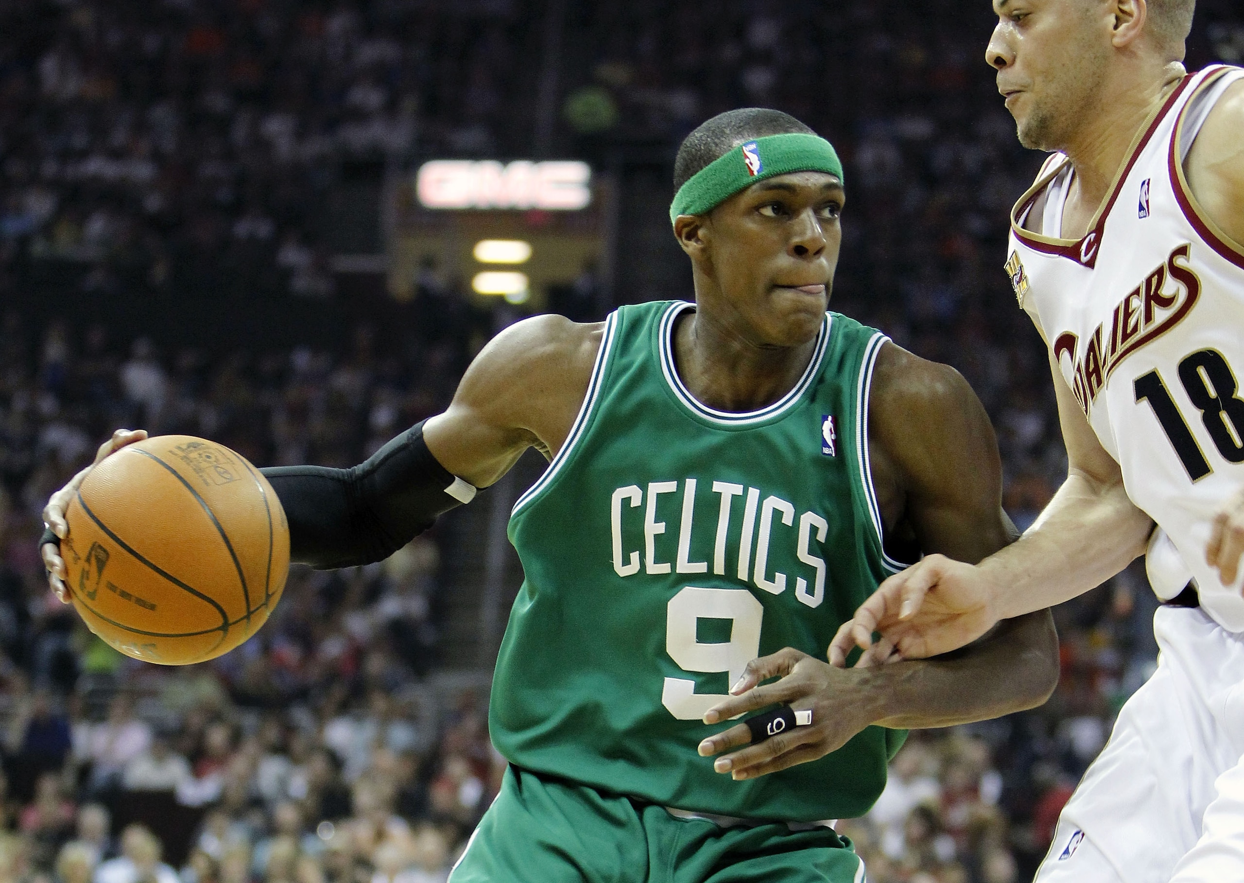 CLEVELAND - MAY 01:  Rajon Rondo #9 of the Boston Celtics tries to drive around Anthony Parker #18 of the Cleveland Cavaliers in Game One of the Eastern Conference Semifinals during the 2010 NBA Playoffs at Quicken Loans Arena on May 1, 2010 in Cleveland,