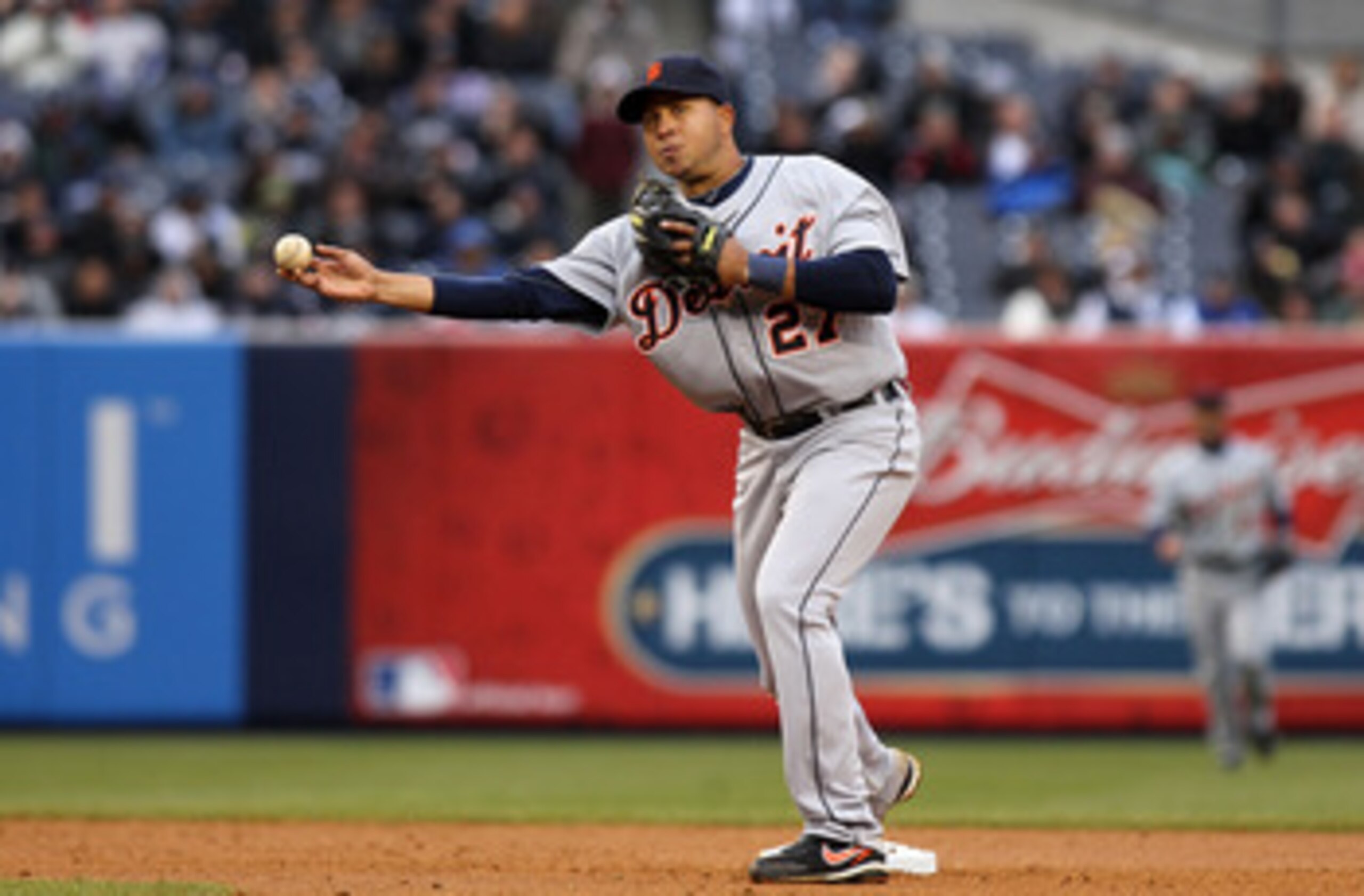 NEW YORK, NY - MARCH 31:  Jhonny Peralta #27 of the Detroit Tigers throws against the New York Yankees on Opening Day at Yankee Stadium on March 31, 2011 in the Bronx borough of New York City.  (Photo by Nick Laham/Getty Images)